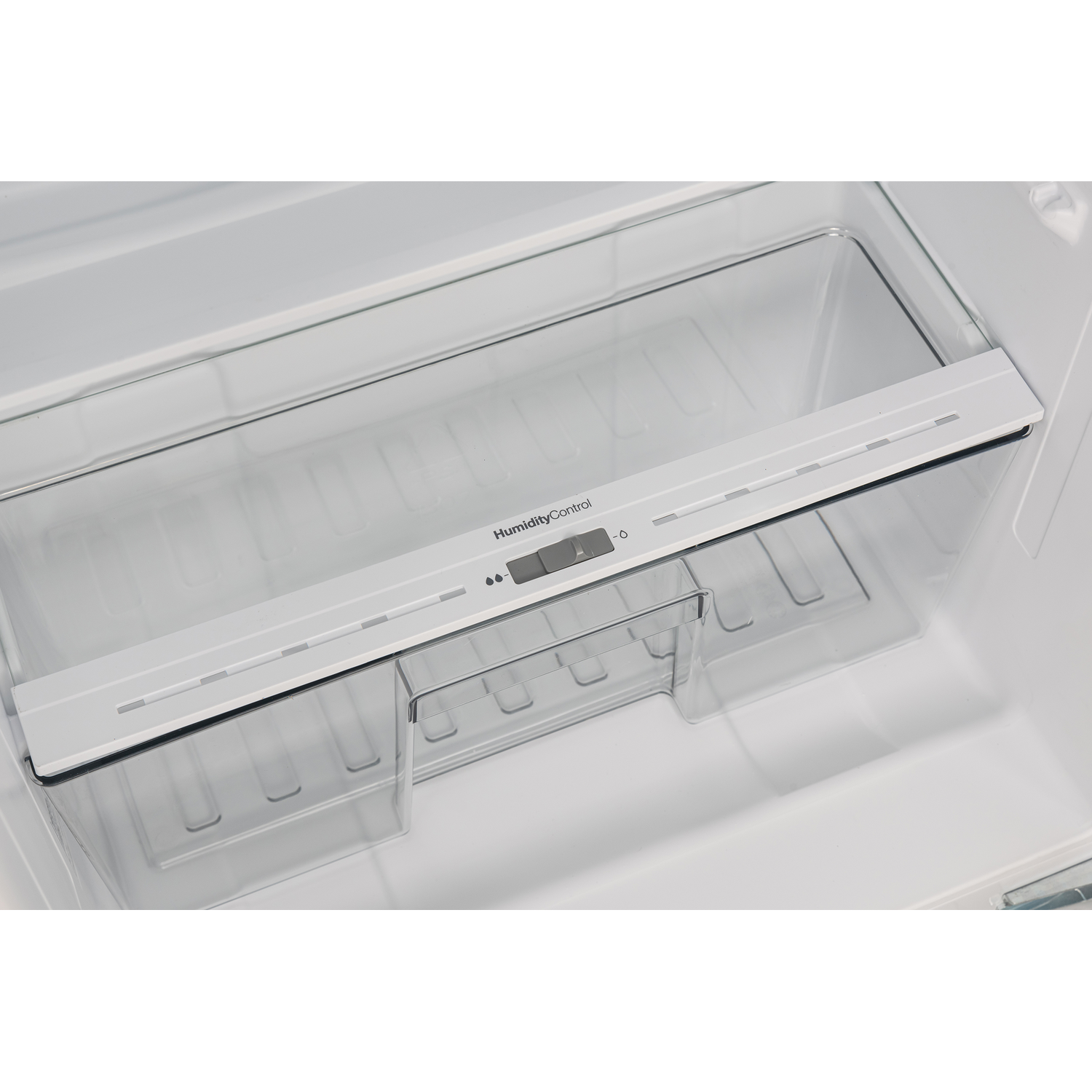 Refrigerator interior with clear shelves, a HumidityControl drawer, and food items.
