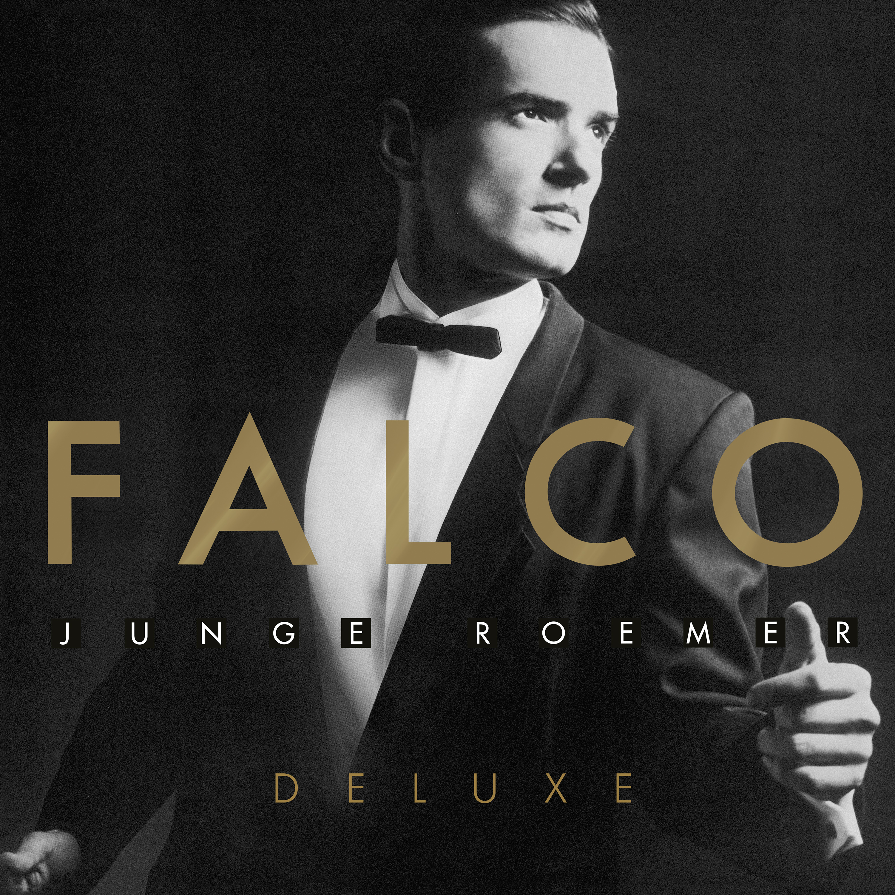 Albumcover von Falco, ein Mann im Anzug, schwarz-weiß, goldener Text.