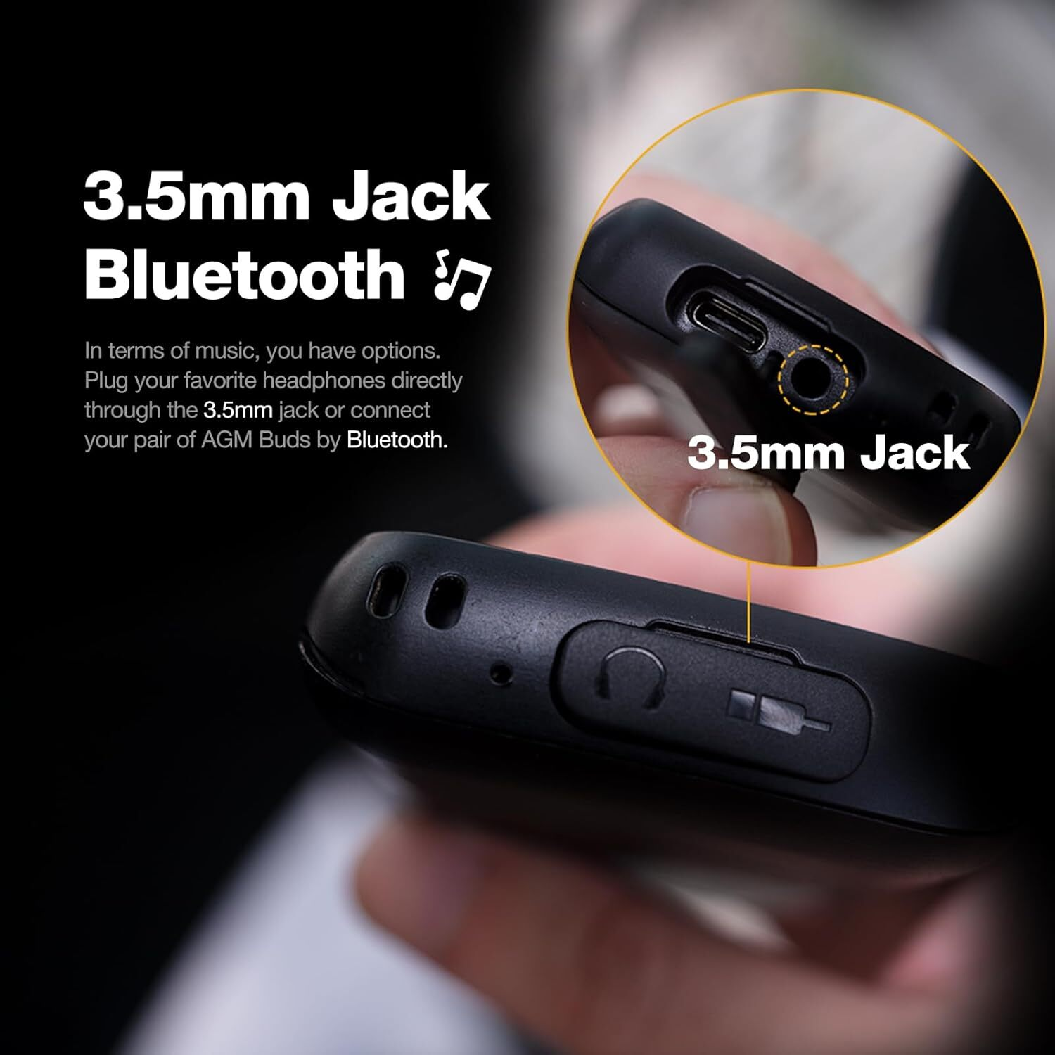 Close-up image of a black phone with 3.5mm jack.