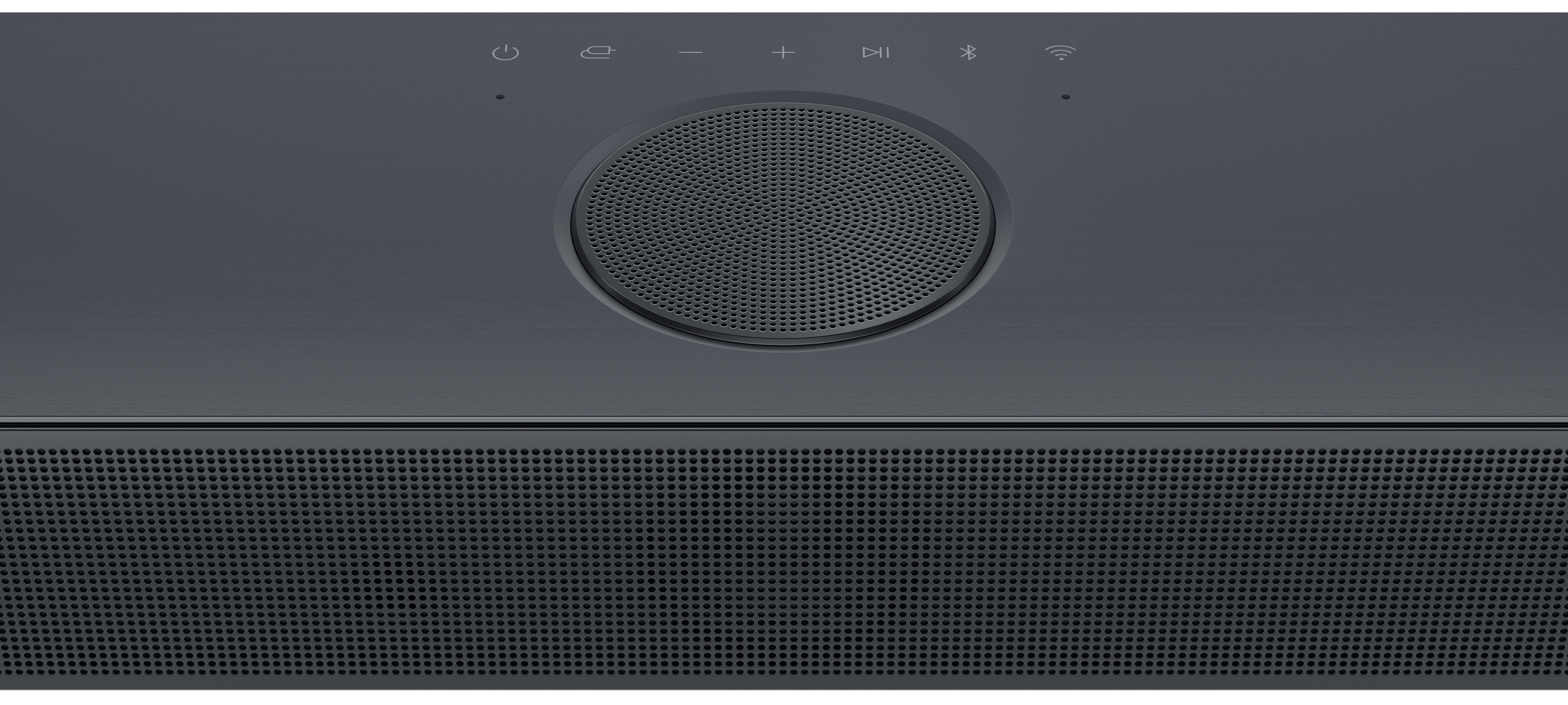 Ciemnoszary soundbar z centralnym głośnikiem, ikonami i dolną kratką głośnika.