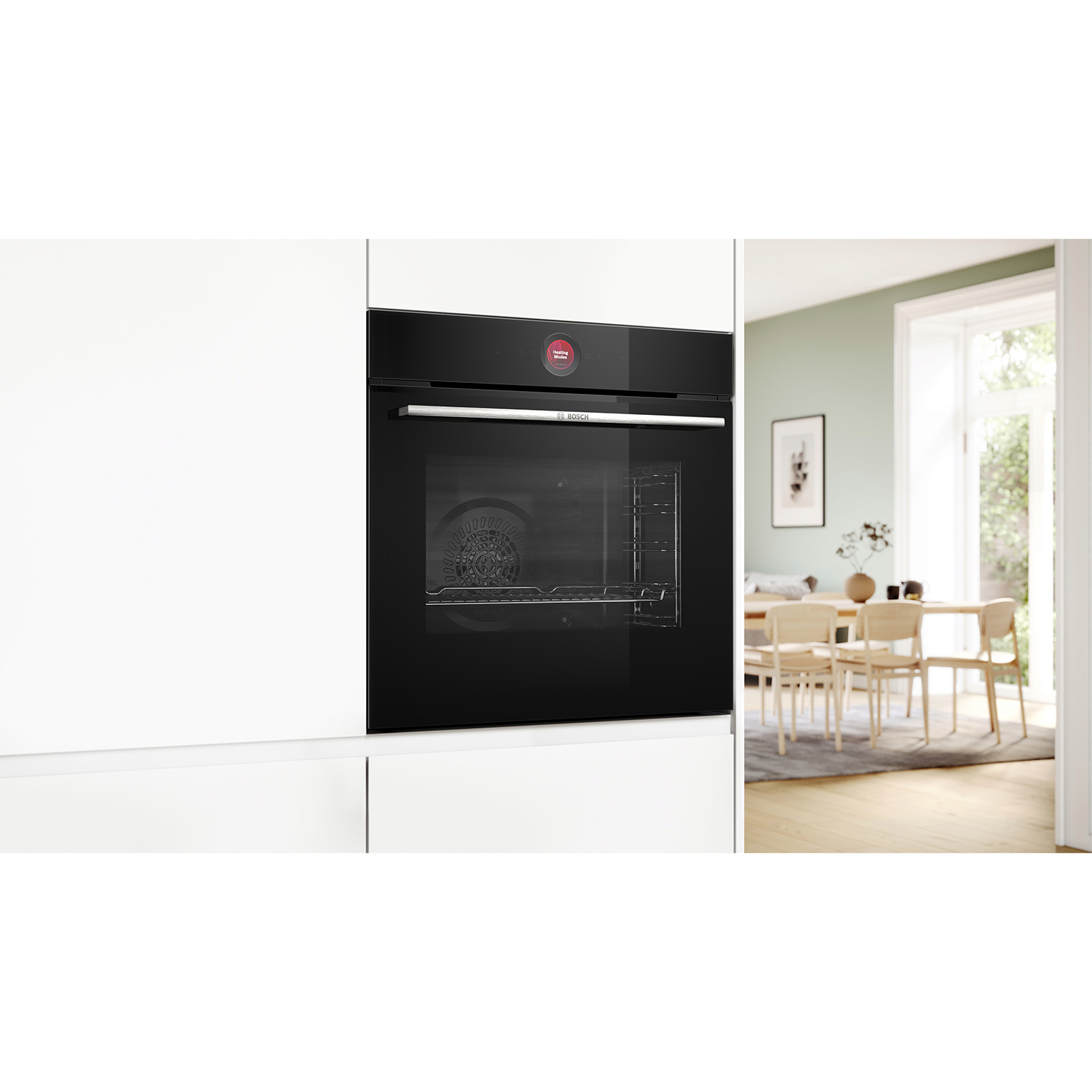 Forno nero a incasso, porta chiusa. Interno visibile. Sfondo bianco e verde menta.
