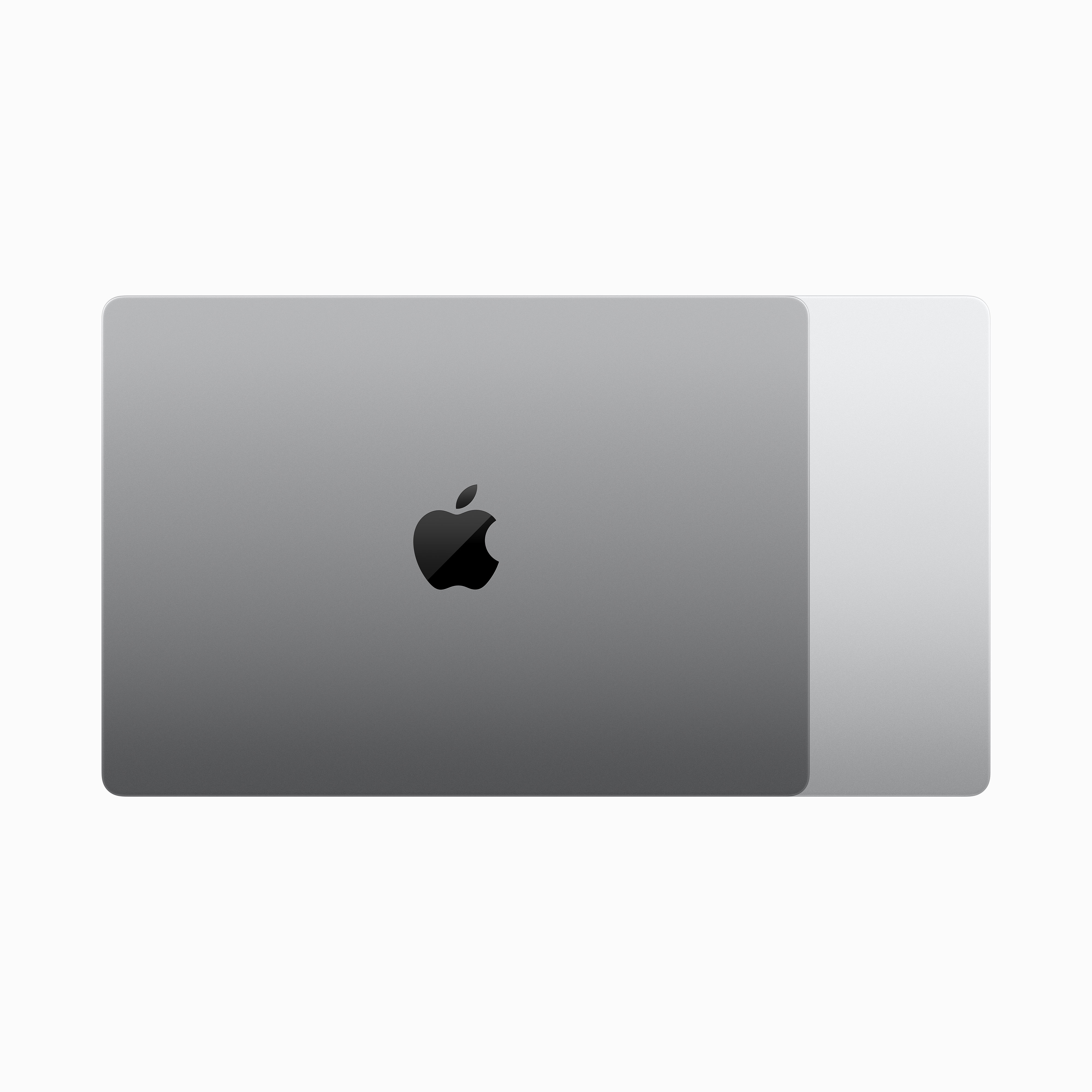 Portátil plateado cerrado con logo Apple. Parte superior brillante, inferior mate.