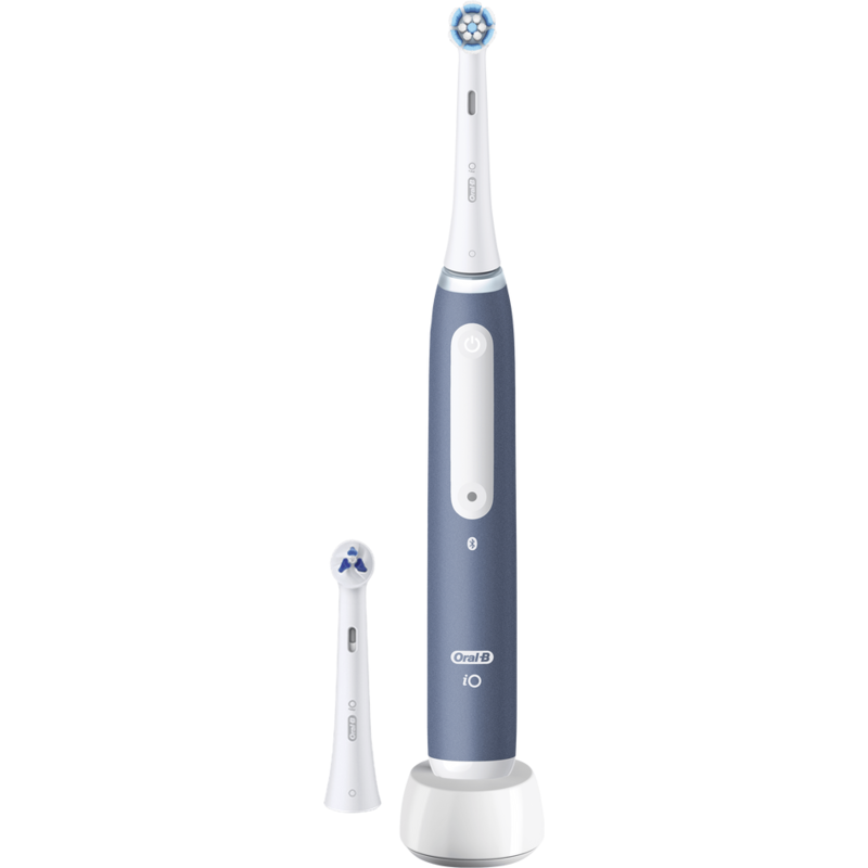 Un cepillo de dientes eléctrico Oral-B iO con base de carga y cabezal extra.