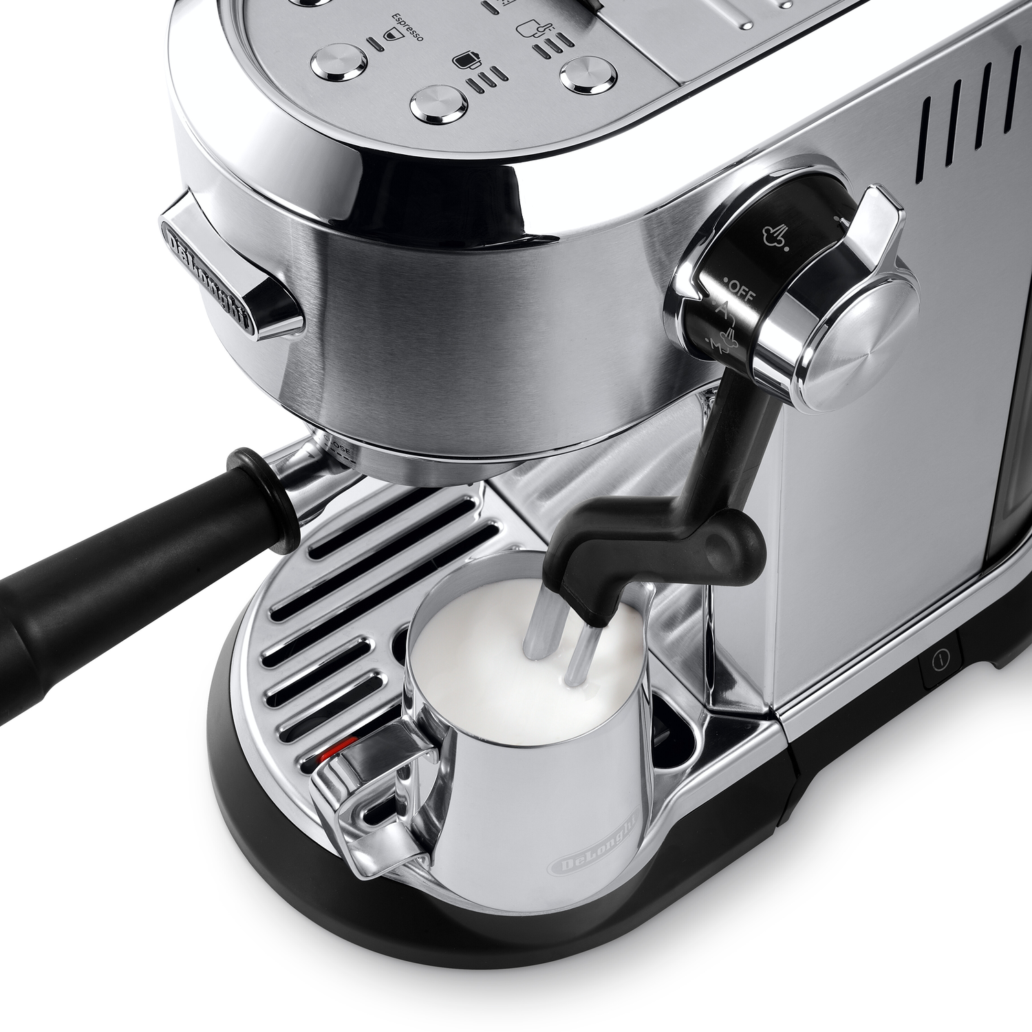 Close up of a chrome espresso machine with a milk frothing pitcher. Black handle.