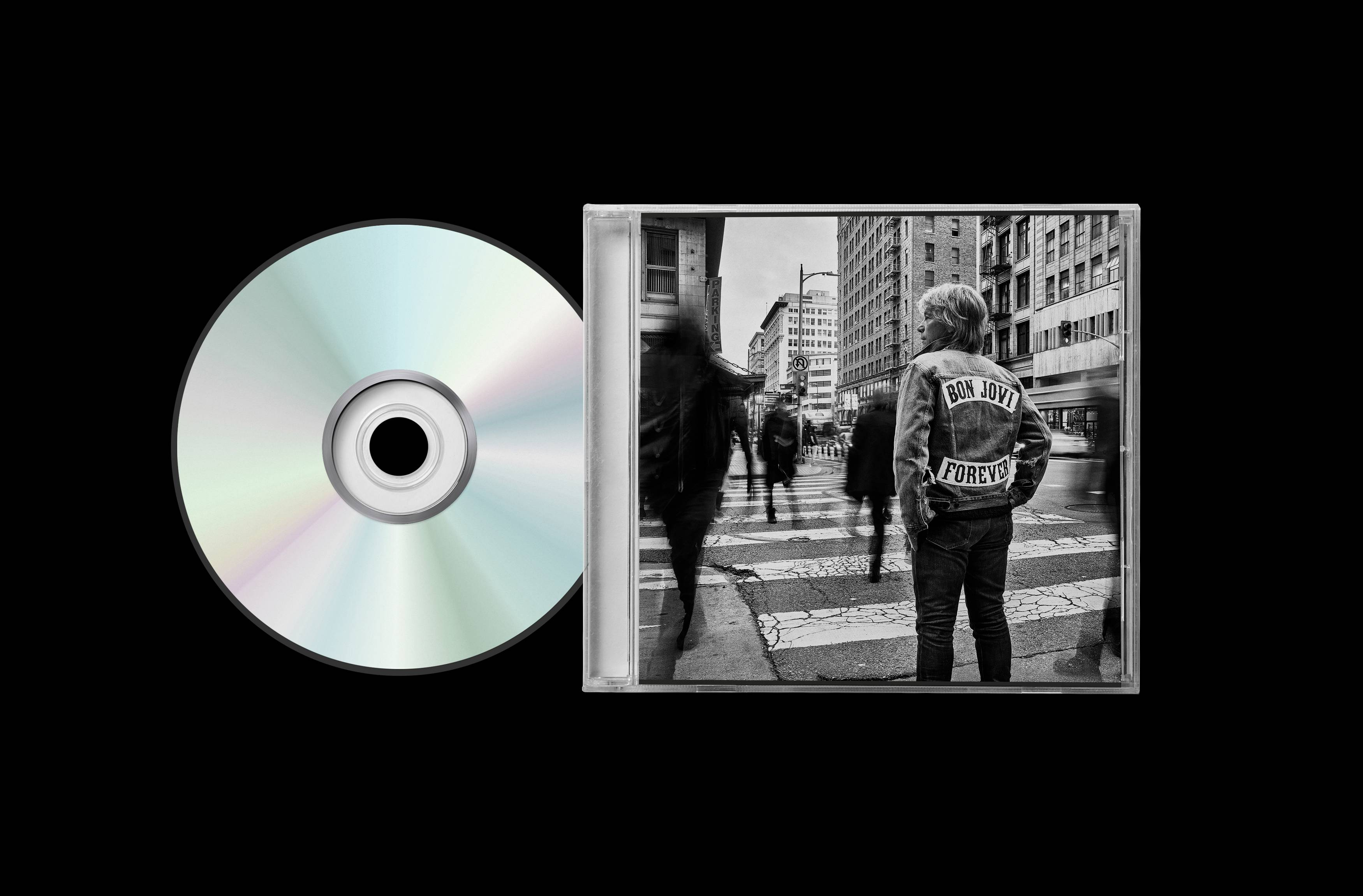 CD und Jewelcase eines Bon Jovi Albums mit schwarzem Hintergrund.