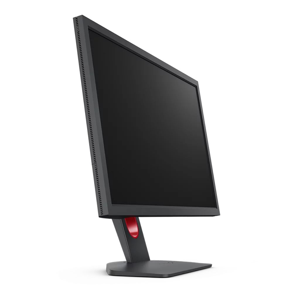 Monitor negro con soporte rojo, inclinado hacia un lado, sobre fondo blanco.