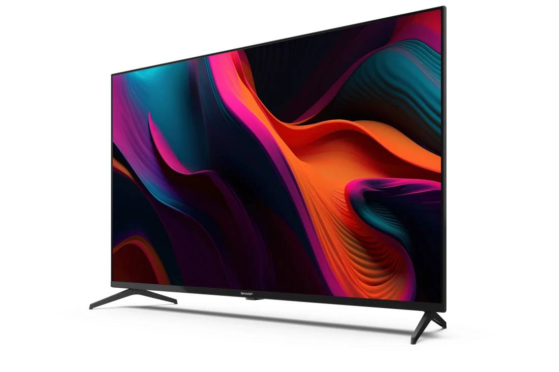 Un televisor Sharp muestra una imagen abstracta colorida sobre un fondo blanco, en ángulo lateral.
