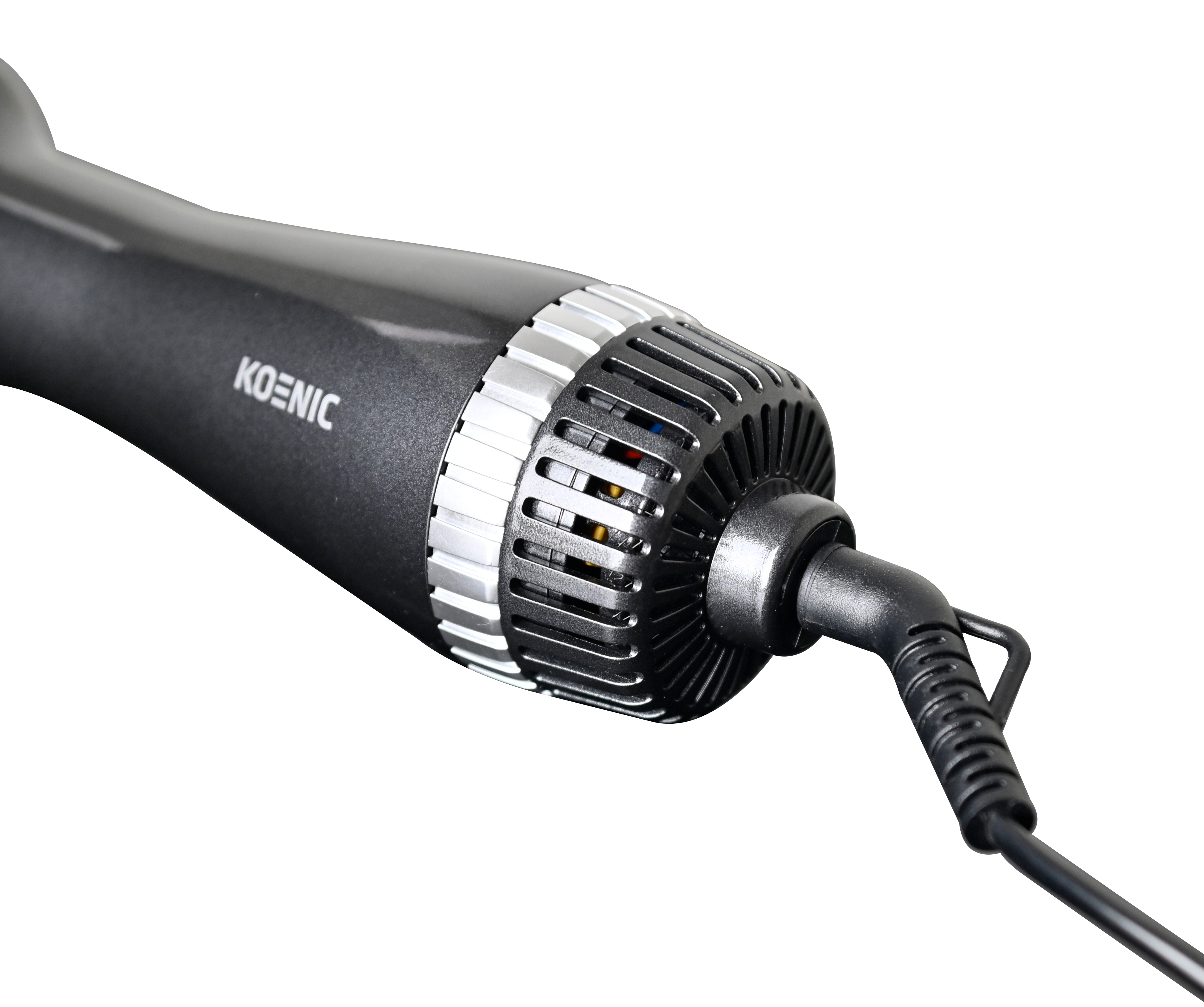 Nahaufnahme eines schwarzen Haartrockners. Der Trockner hat ein graues Metallteil und ein schwarzes Netzkabel.