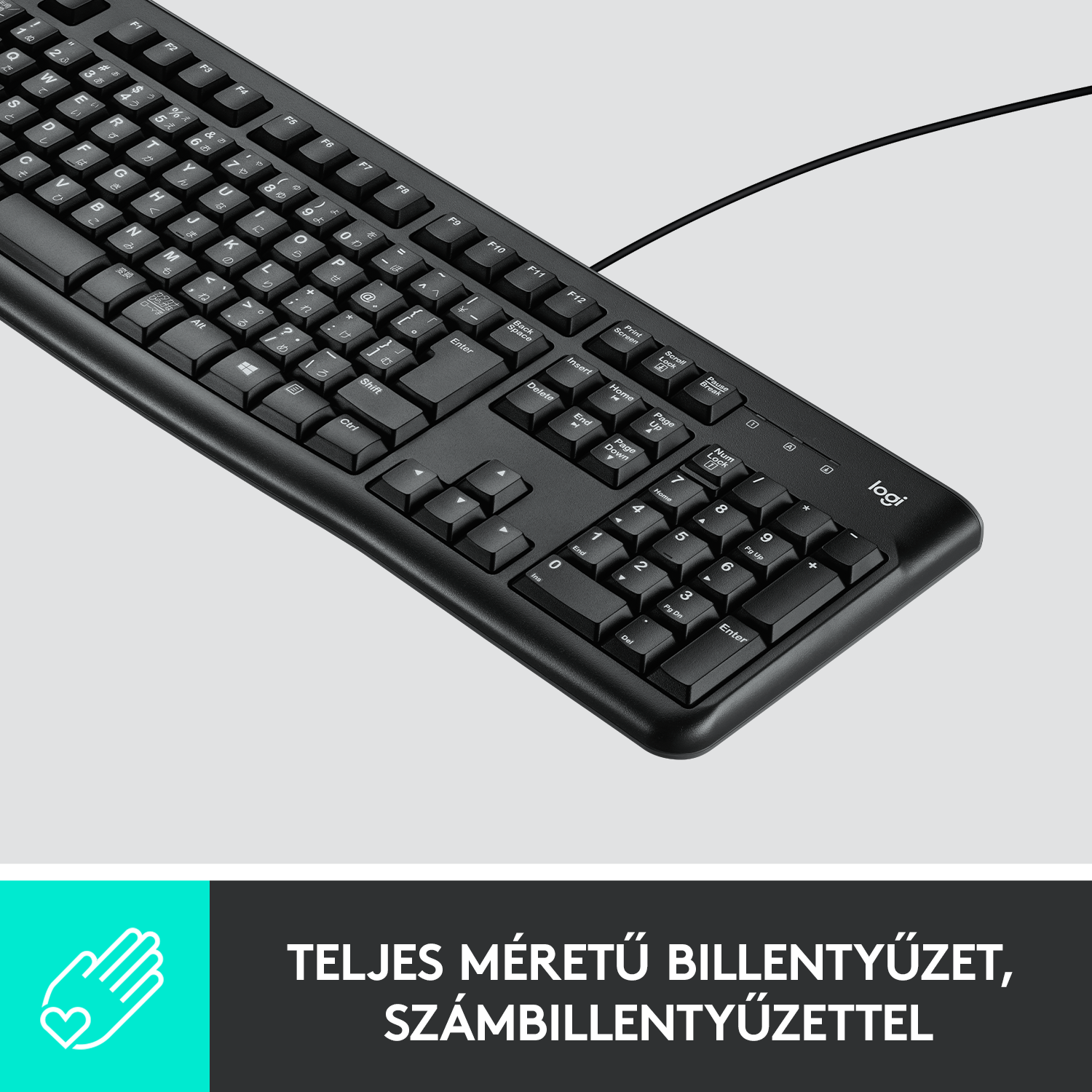 Fekete billentyűzet fehér billentyűkkel és numerikus paddal. Alul magyar szöveg.