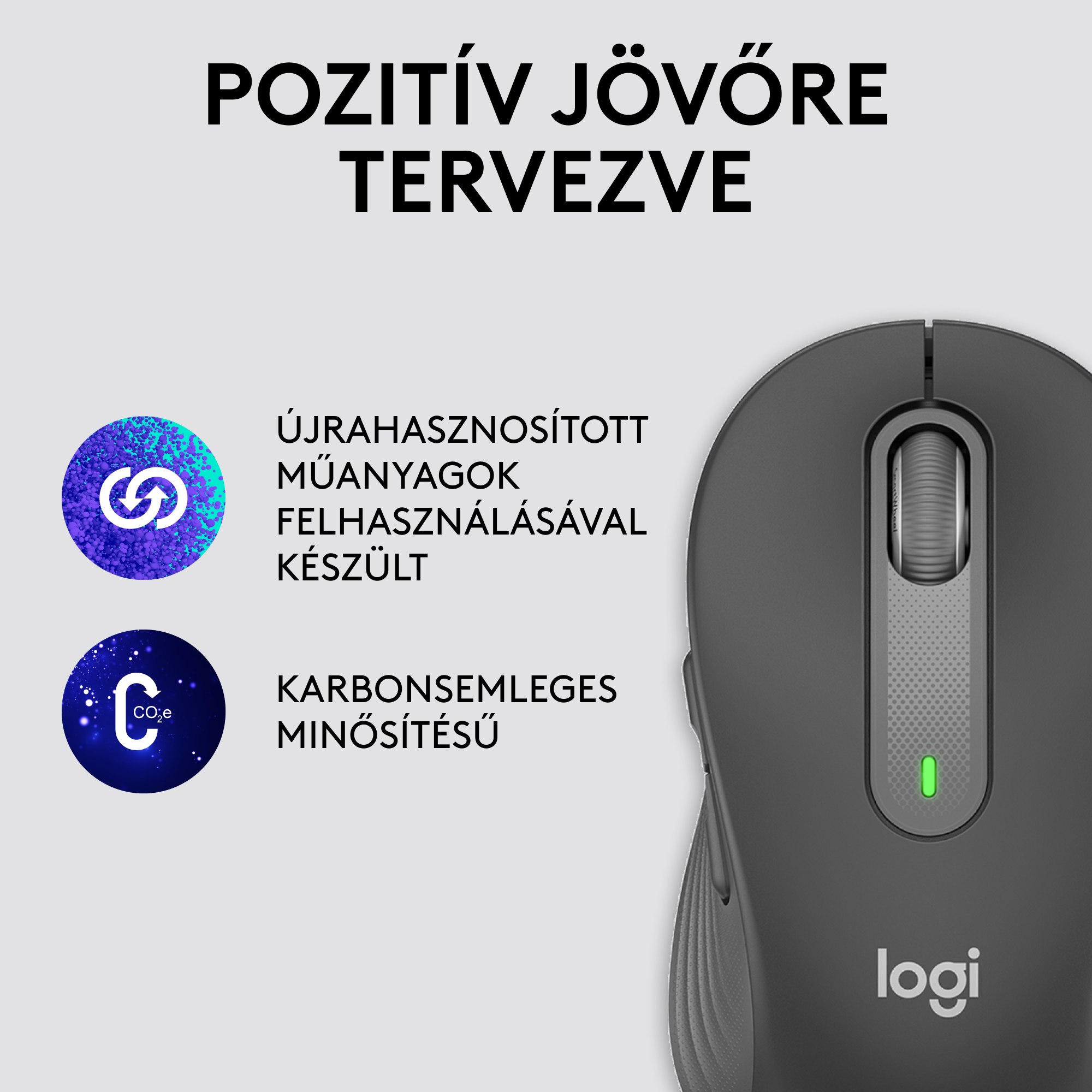 Egy sötétszürke Logitech egér zöld fénnyel.