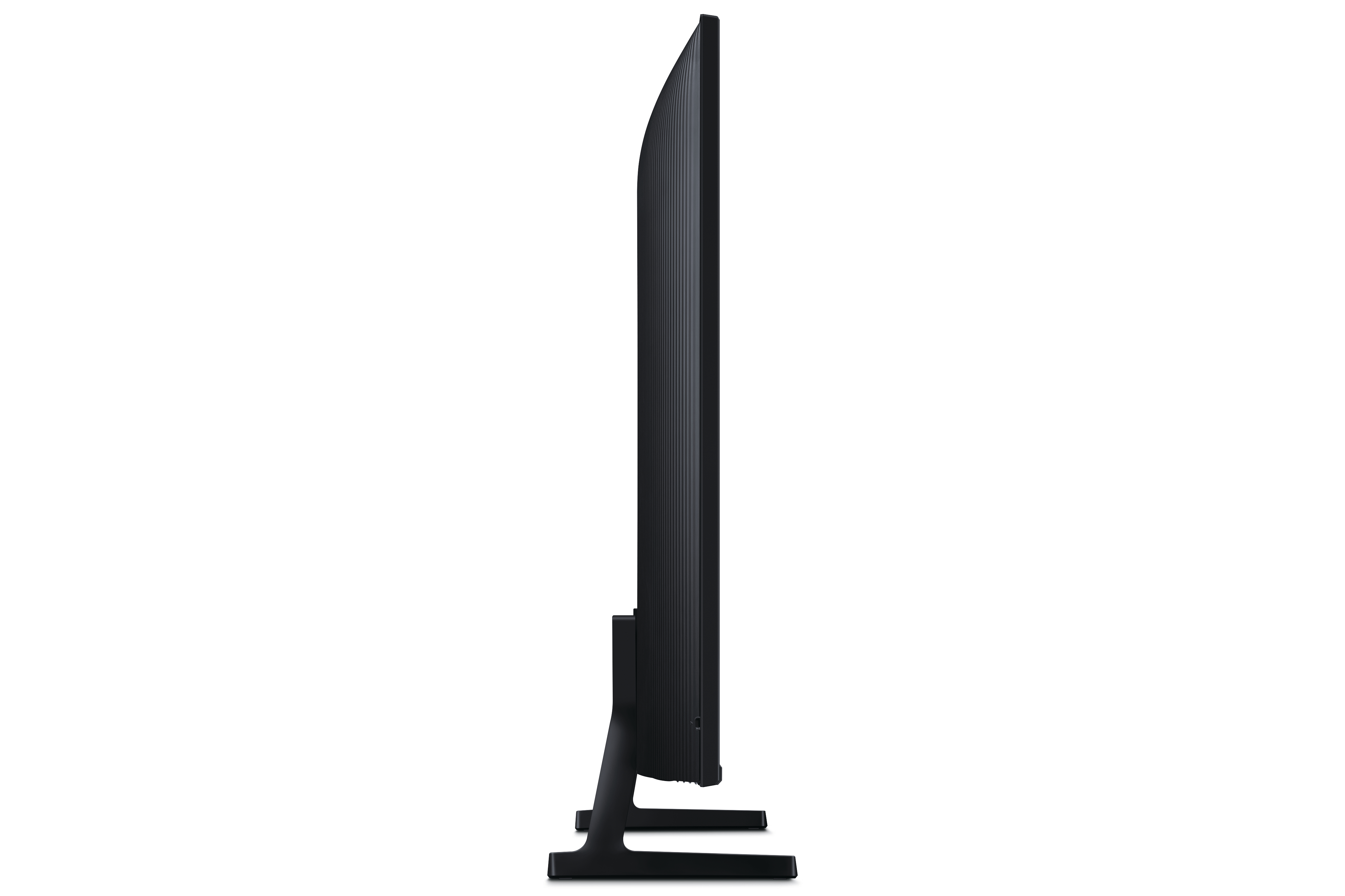 Eine Seitenansicht eines schwarzen Fernsehers. Der Fernseher steht auf einem Ständer und hat ein minimalistisches Design.