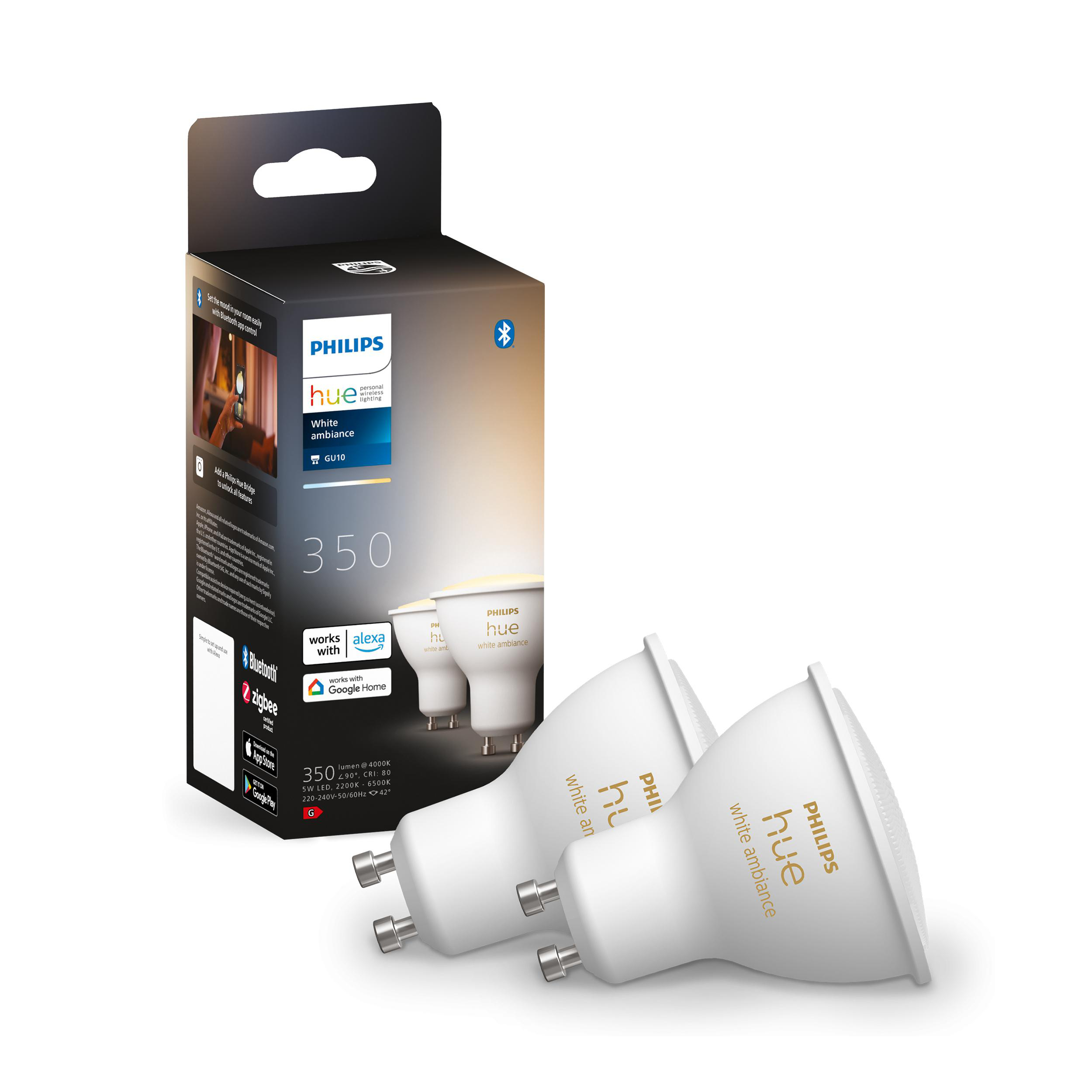 Philips Hue Glühbirnen in einer Box, mit zwei Birnen davor.