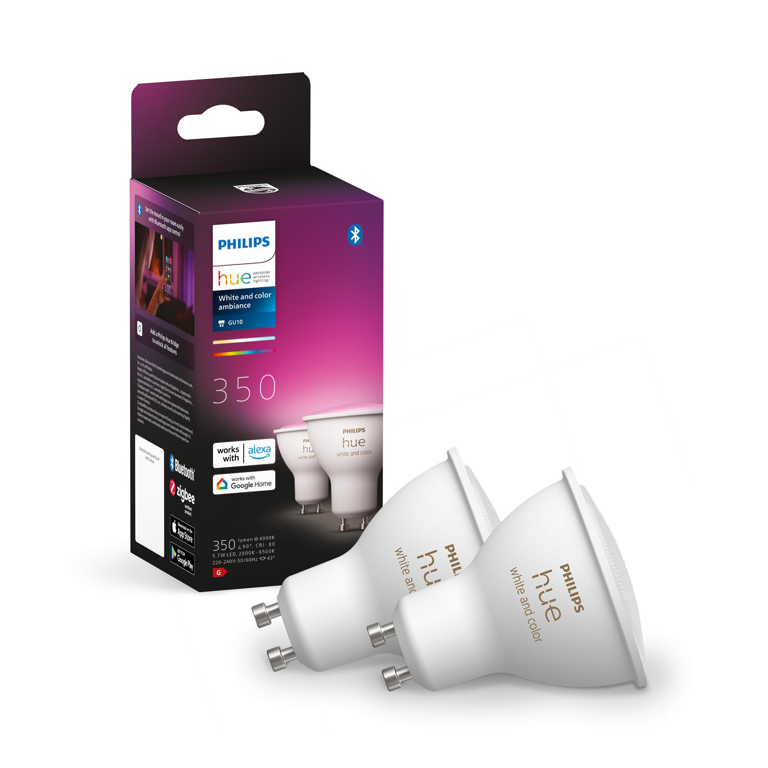 Eine Schachtel mit zwei weißen Philips Hue Glühbirnen und weitere drei im Hintergrund.