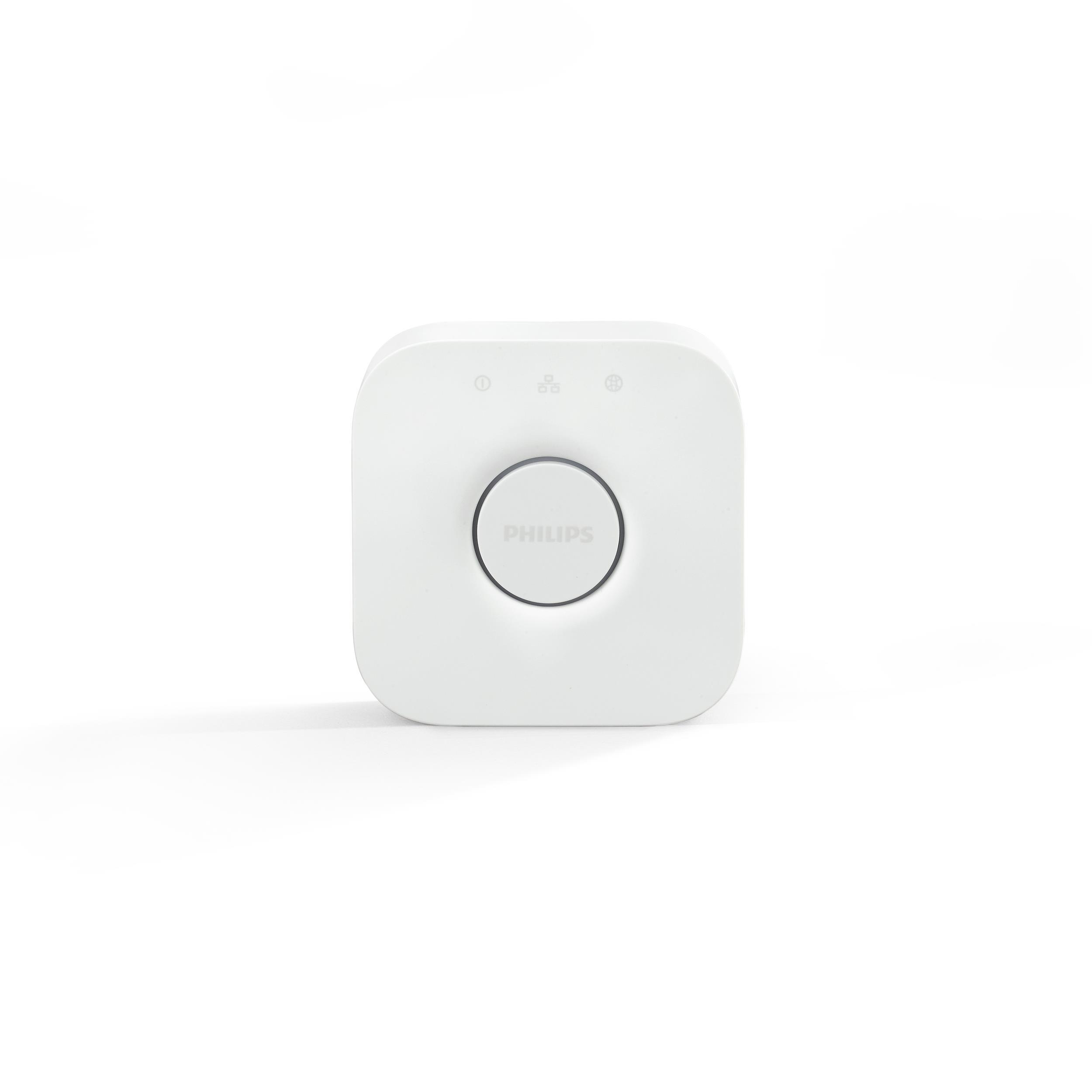 Ein weißer, quadratischer Smart-Home-Hub mit zentralem Knopf auf weißem Hintergrund.