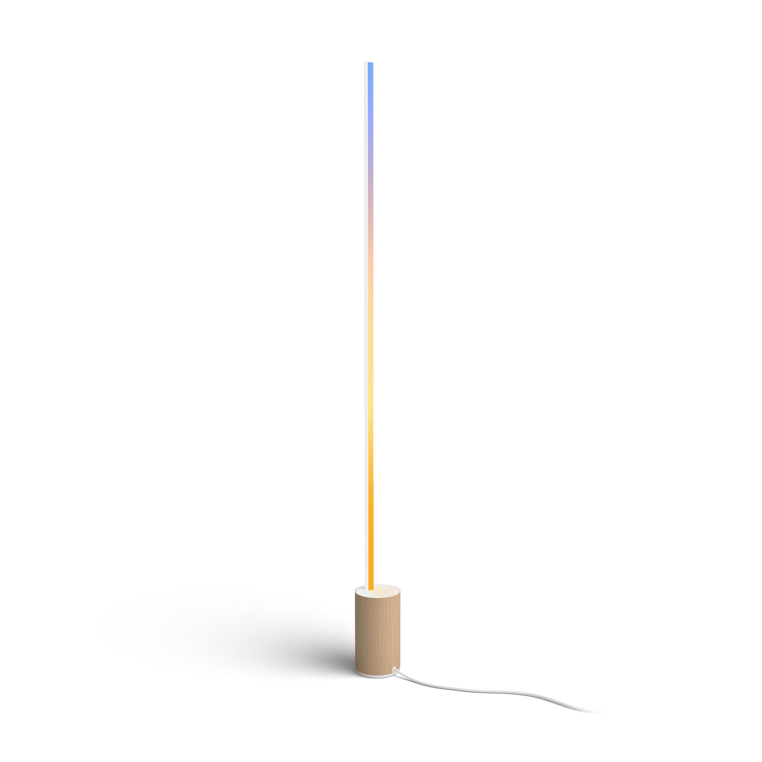 Hohe, schlanke Stehlampe mit beigem Sockel und vertikalem Lichtbalken, der die Farben wechselt.