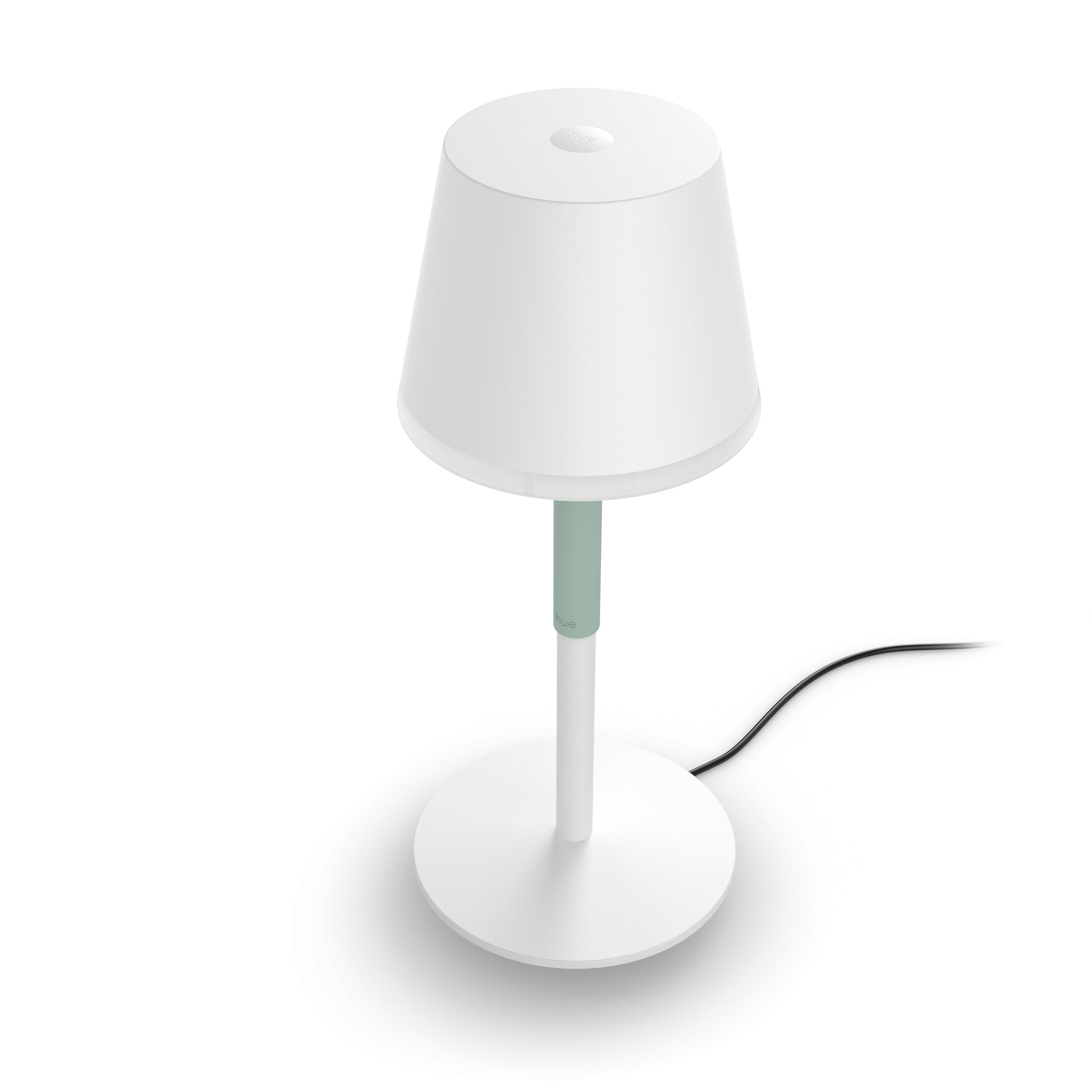 Weiße Tischlampe mit grünem Stiel, weißem Schirm und rundem Fuß, Draufsicht.