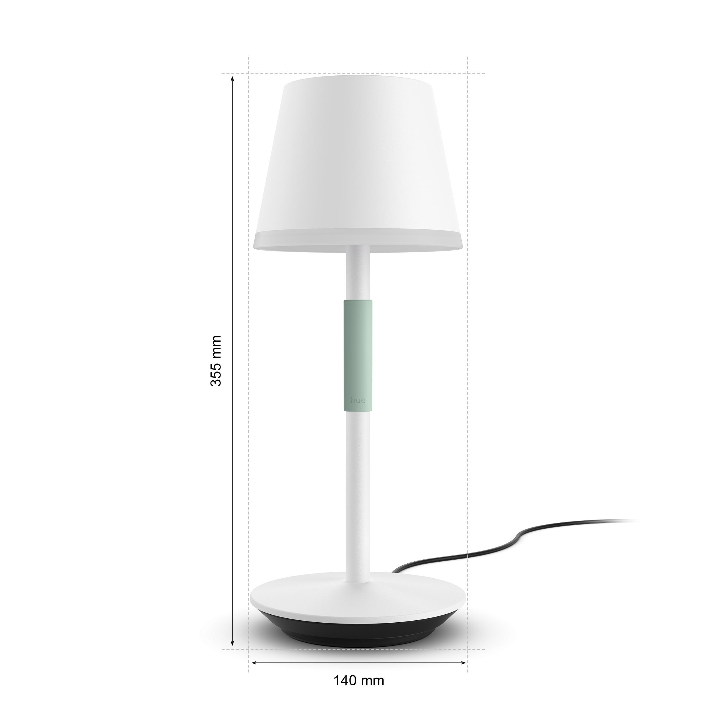 Weiße Lampe mit grünem Detail am Stiel. Sie hat einen weißen Lampenschirm. Abmessungen sind angegeben.
