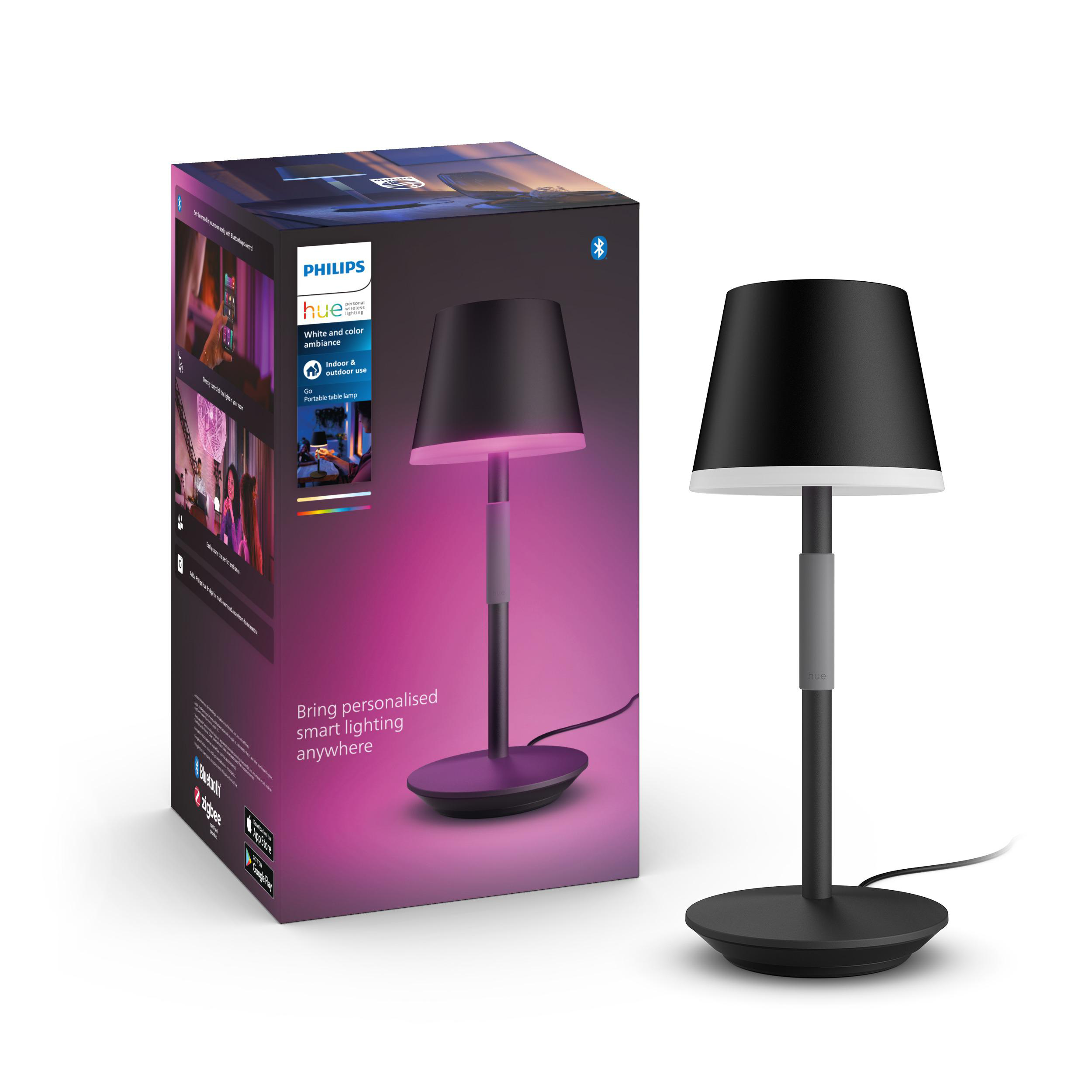Schwarze Philips Hue Lampe in einer Box. Rosa und schwarzes Farbschema. Tragbares Lampendesign.