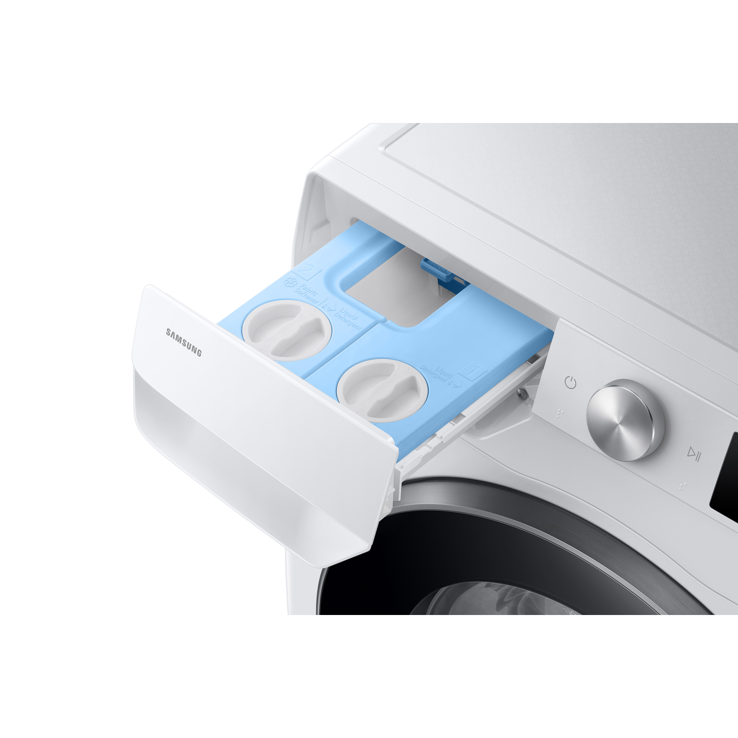 Close-up of a washing machine's open detergent drawer, with blue compartments.
