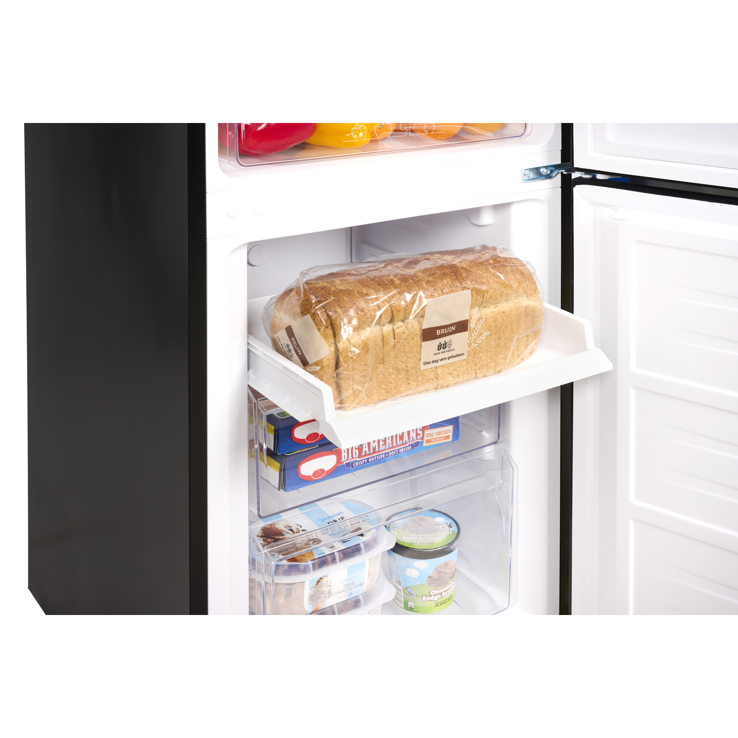 Refrigerator interior with bread, frozen food. Open door, black side.
