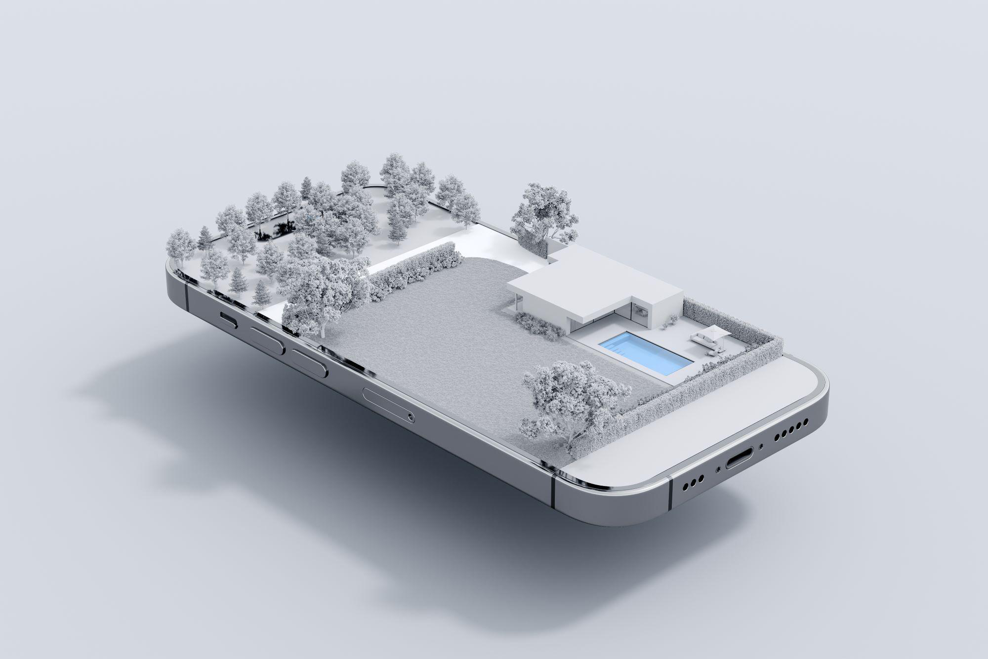 Smartphone mit einem Modell eines Hauses und einer Landschaft auf dem Bildschirm.