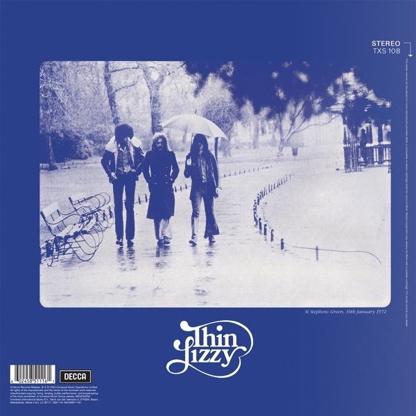 A Thin Lizzy, együttes album borítója, a zenekarról készült fotóval egy parkban.