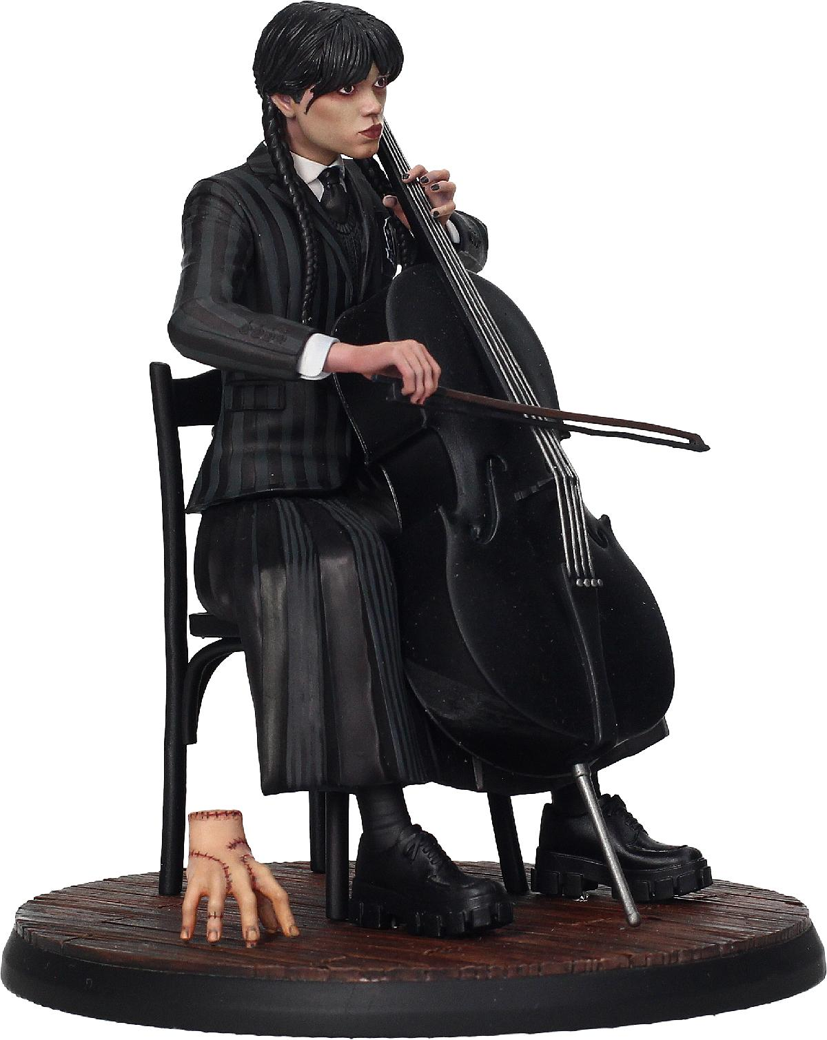 Eine Statue einer Frau in schwarzem Kleid, die Cello spielt, mit einer abgehackten Hand auf dem Sockel.