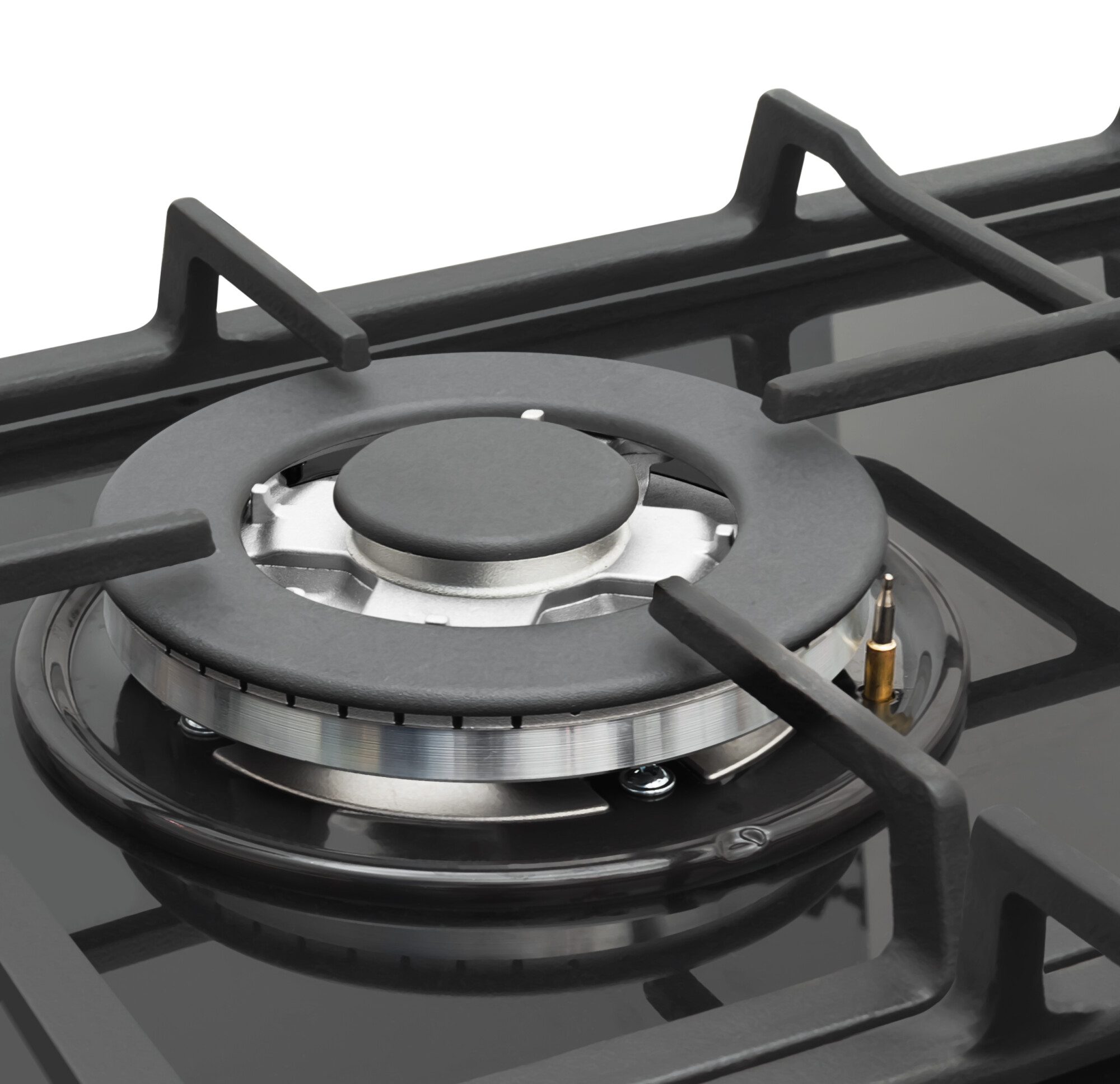 Zbliżenie palnika kuchenki gazowej z czarnym rusztem i srebrnym palnikiem.