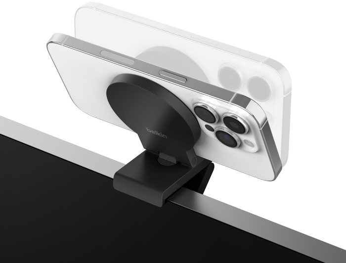 Fekete Belkin telefontartó számítógép monitorhoz rögzítve, fehér telefont tart.