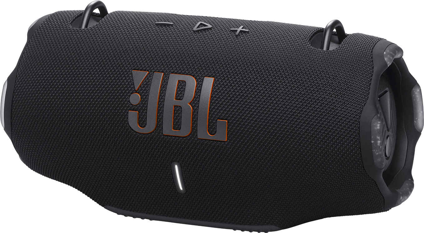 Fekete JBL hangszóró narancssárga JBL logóval. A hangszóró hálós szövetből és pántokból áll.