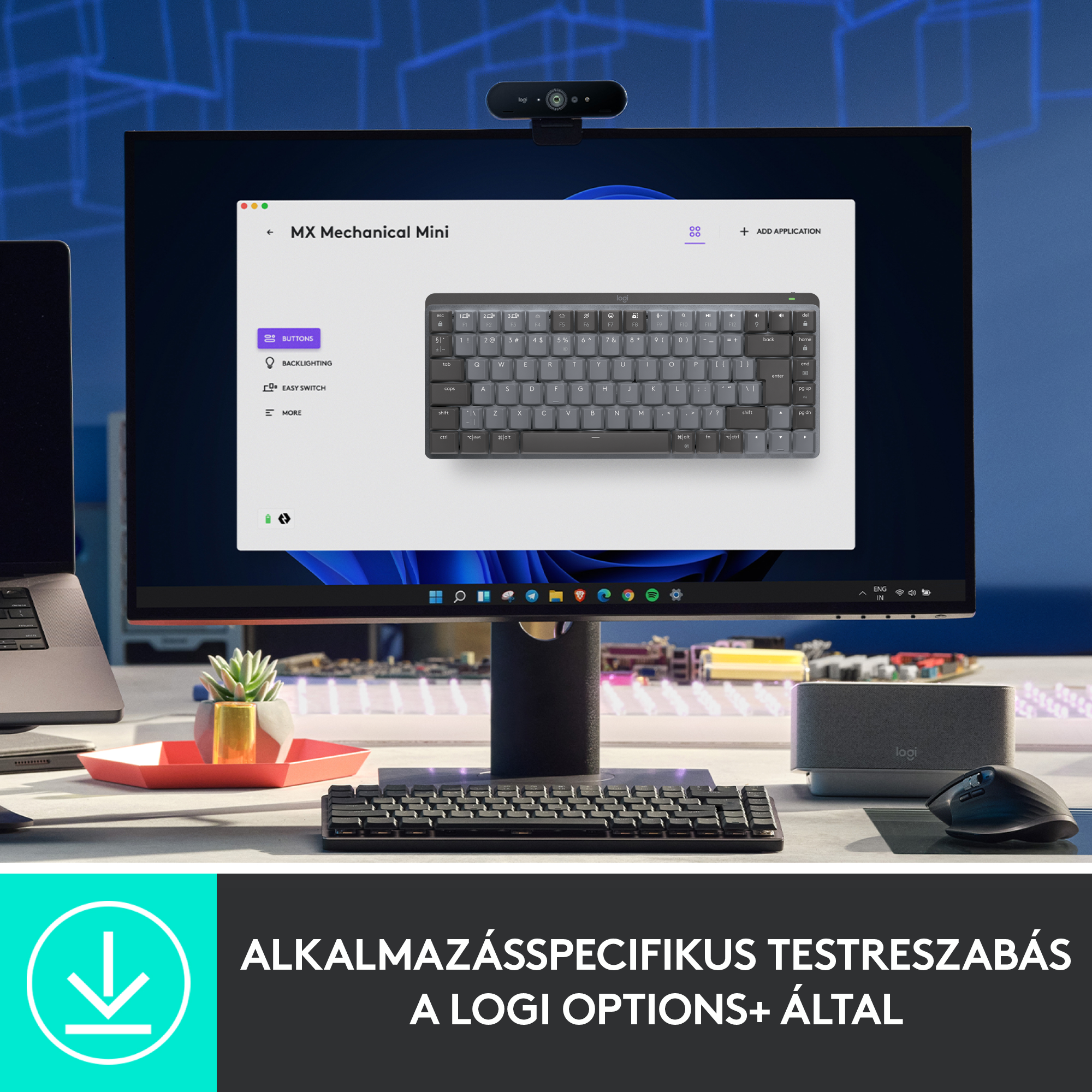 Asztali beállítás monitorral, billentyűzettel, egérrel és webkamerával. Alkalmazás felülete a képernyőn.