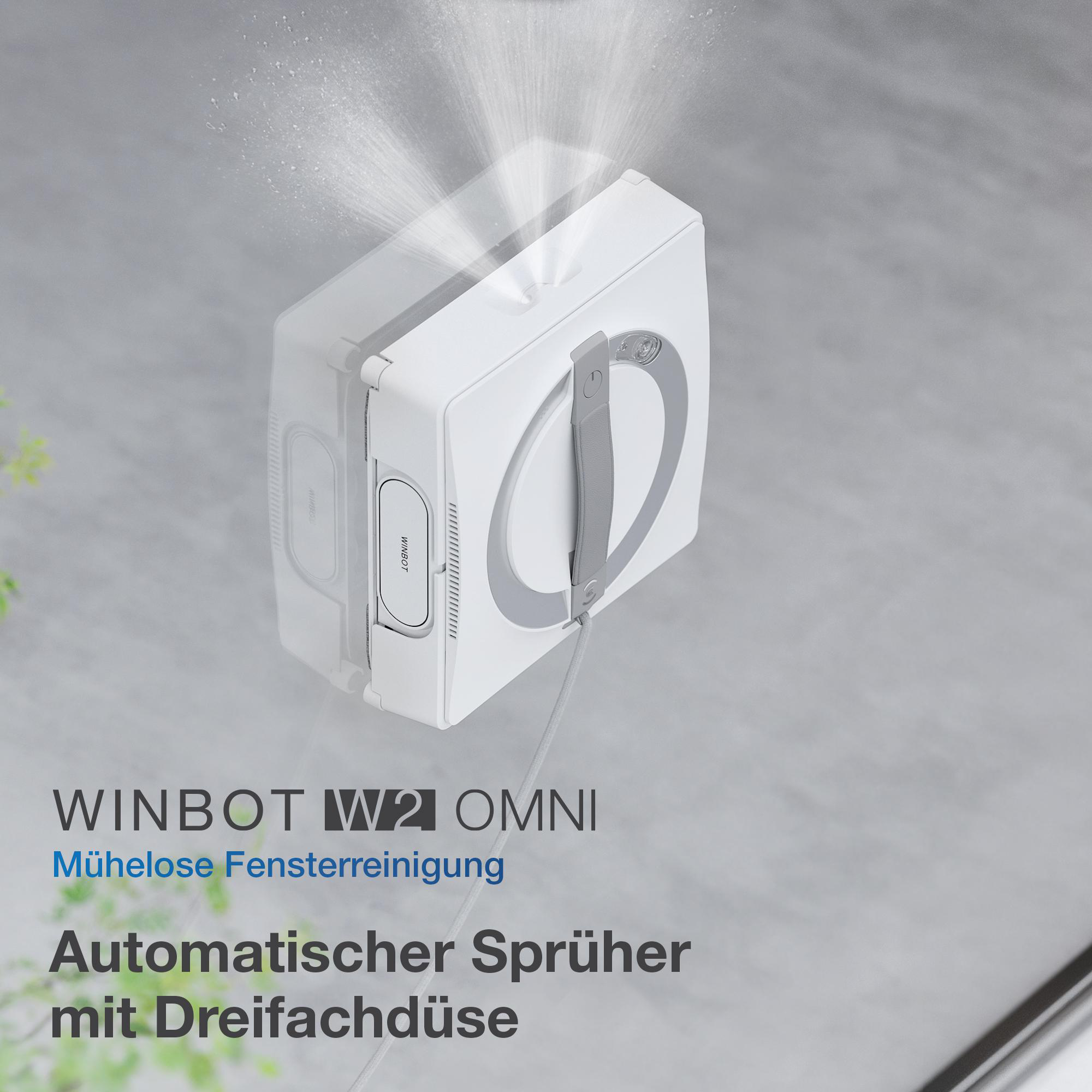 Ein Fensterputzroboter, der Wasser sprüht.