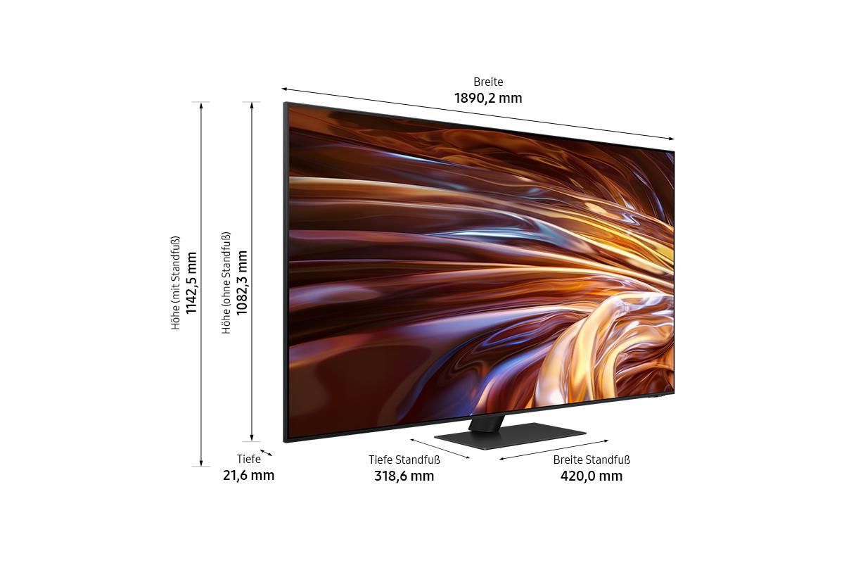 Ein großer Flachbildfernseher mit Maßangaben. Der Bildschirm zeigt ein abstraktes, farbenfrohes Design.