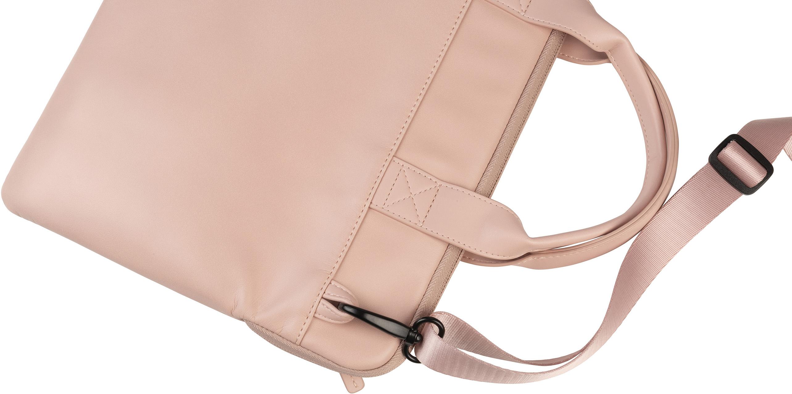 Sac rose avec anse et sangle. Une fermeture éclair et une boucle noires sont visibles.