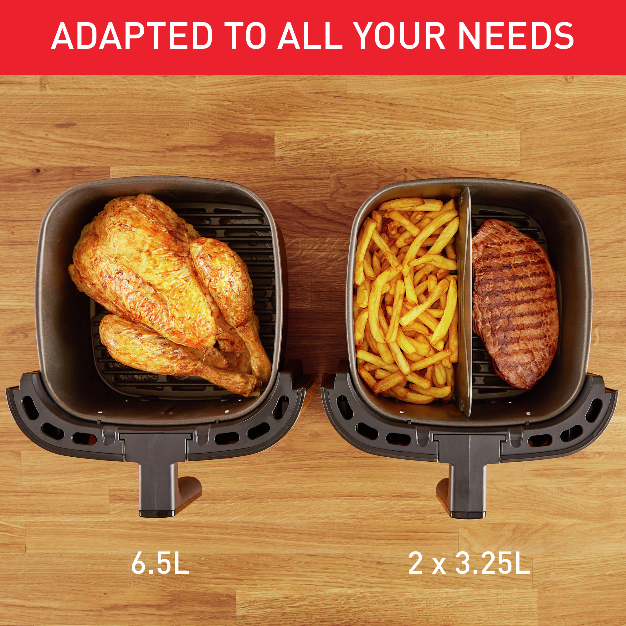 Een airfryer met kip, friet en biefstuk, op een houten oppervlak.