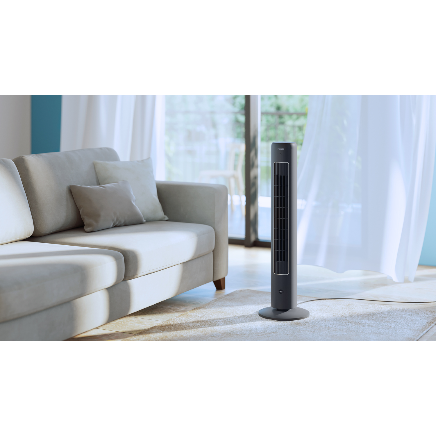 A black tower fan in a room with a couch and curtains.