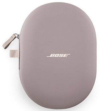 Jasnoszara obudowa słuchawek Bose. Obudowa jest owalna i ma logo Bose.