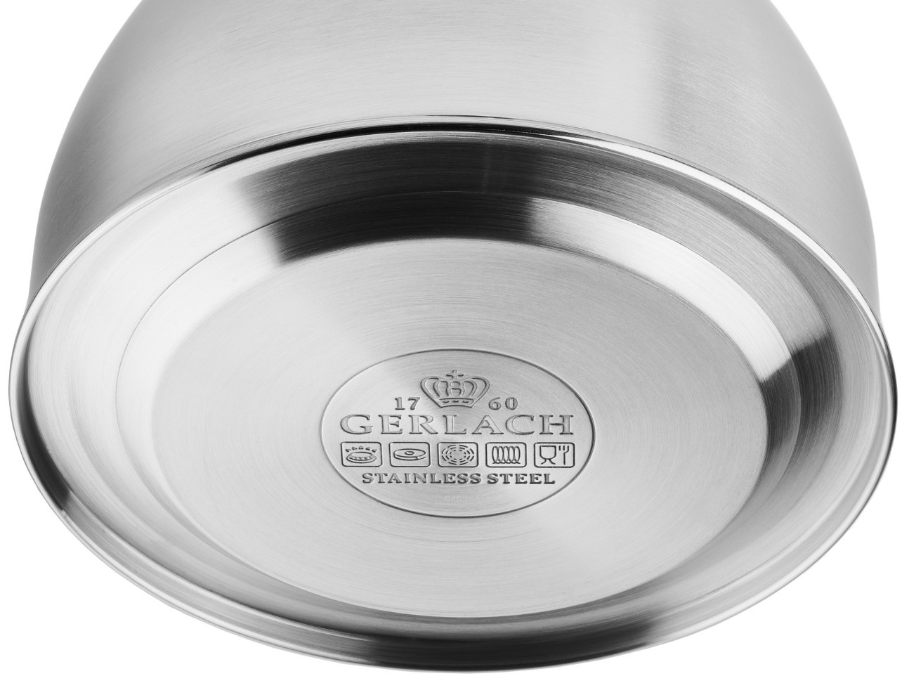 Widok od spodu garnka ze stali nierdzewnej z nazwą marki i oznaczeniami.