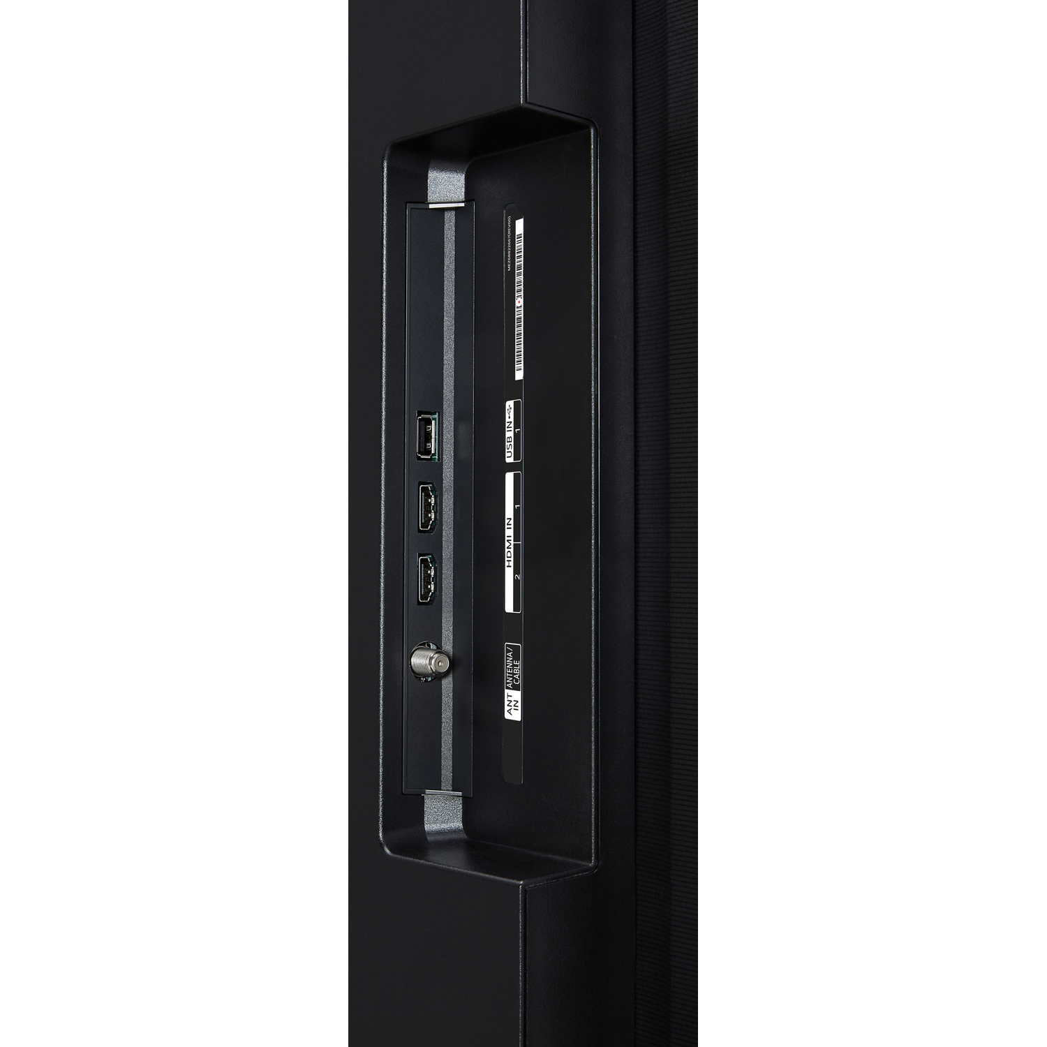 Close-up van de achterkant van een zwarte tv met poorten. USB, HDMI, antenne en andere ingangen zijn zichtbaar.
