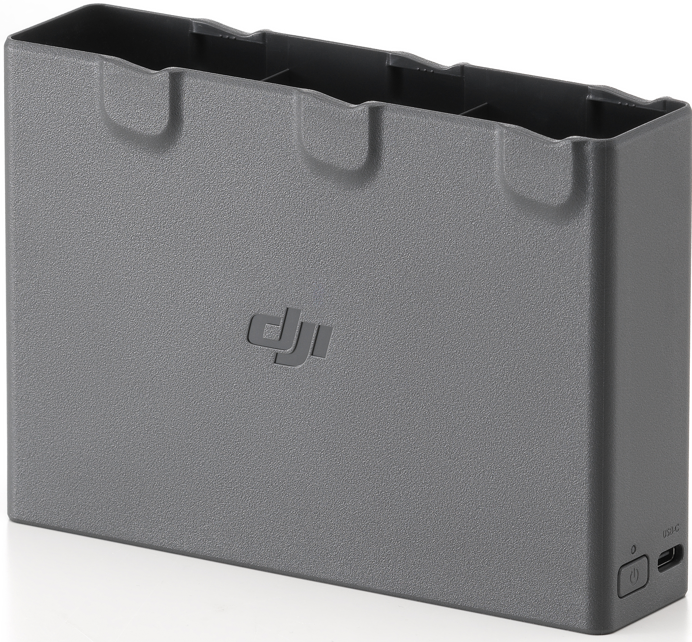 Eine graue Box mit dem DJI-Logo wird gezeigt. Es hat mehrere Fächer.