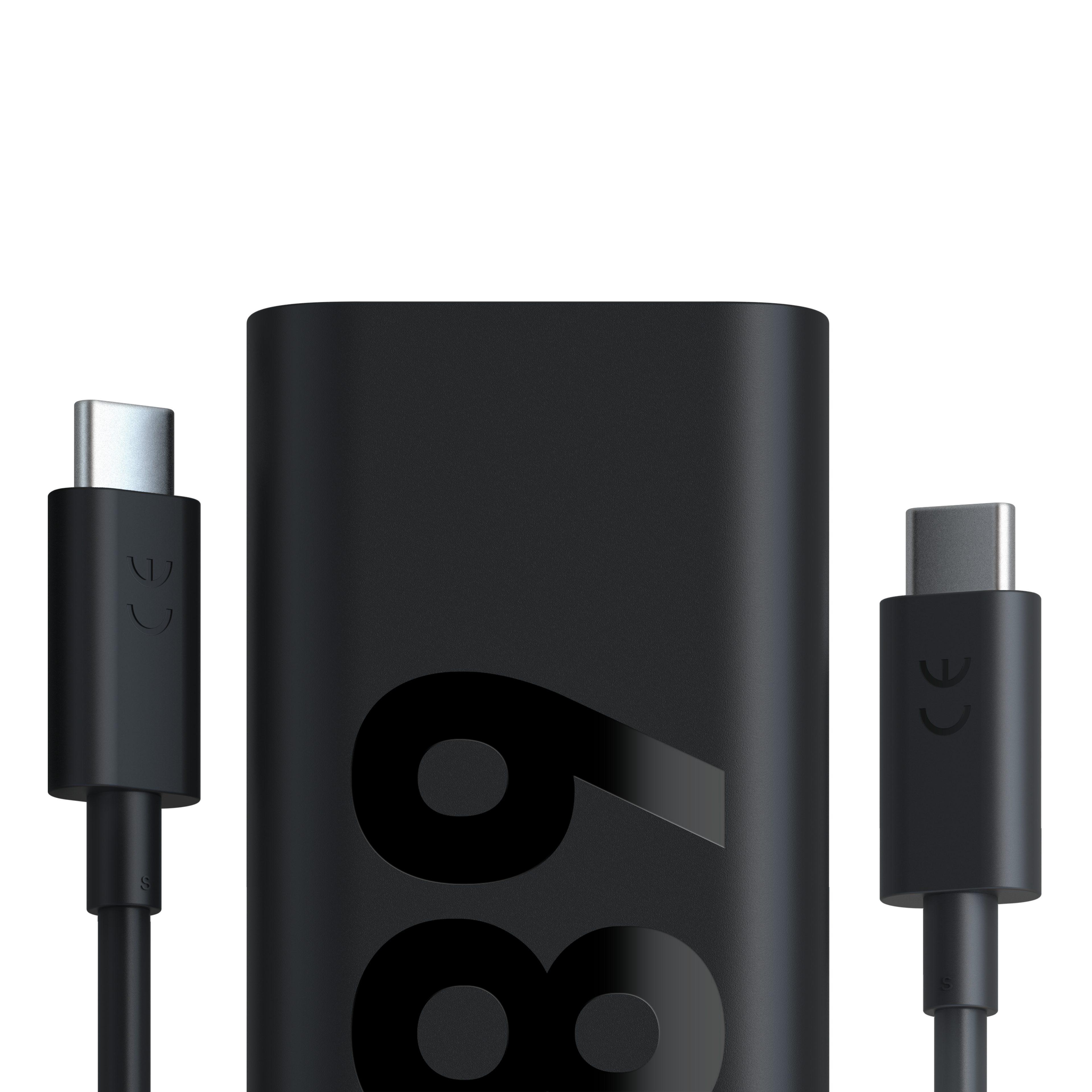 Zwei schwarze USB-C-Kabel und ein schwarzes Netzteil mit der Nummer 69.