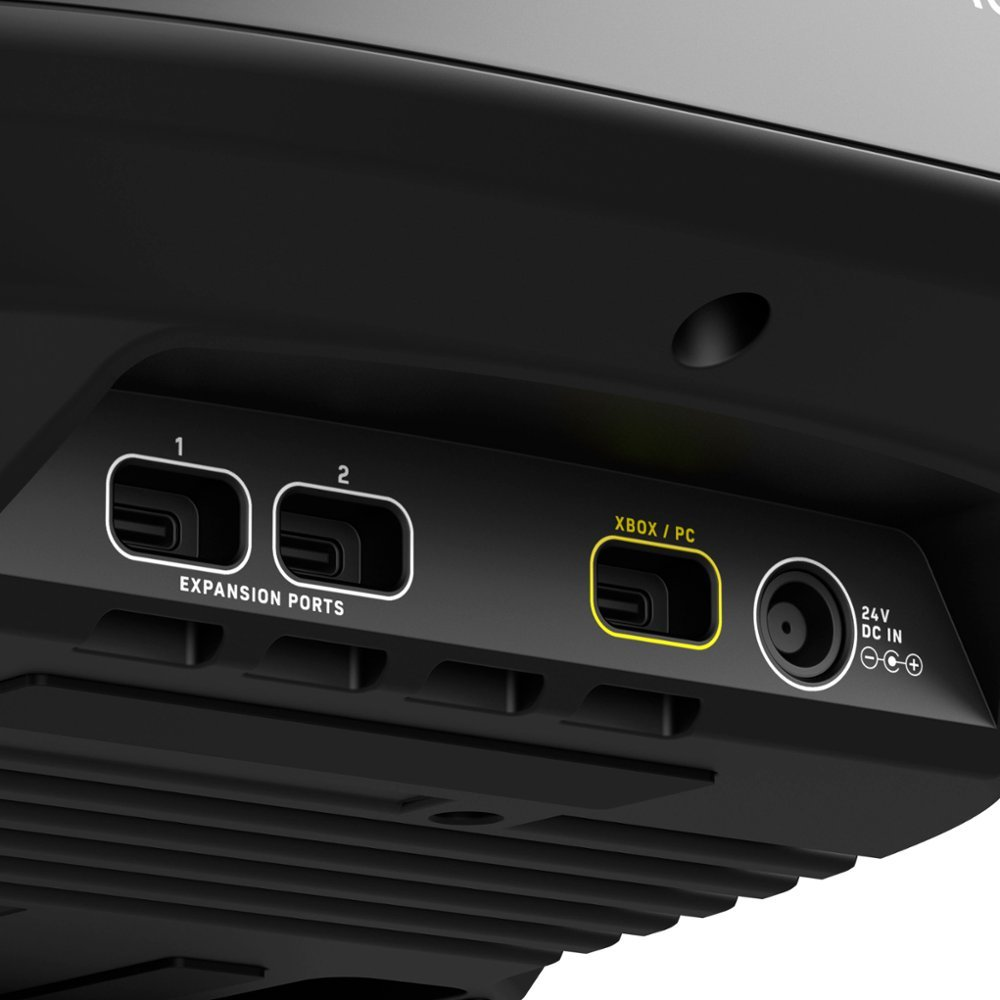 Tylny panel czarnej konsoli do gier, z portami Xbox/PC i portami rozszerzeń.