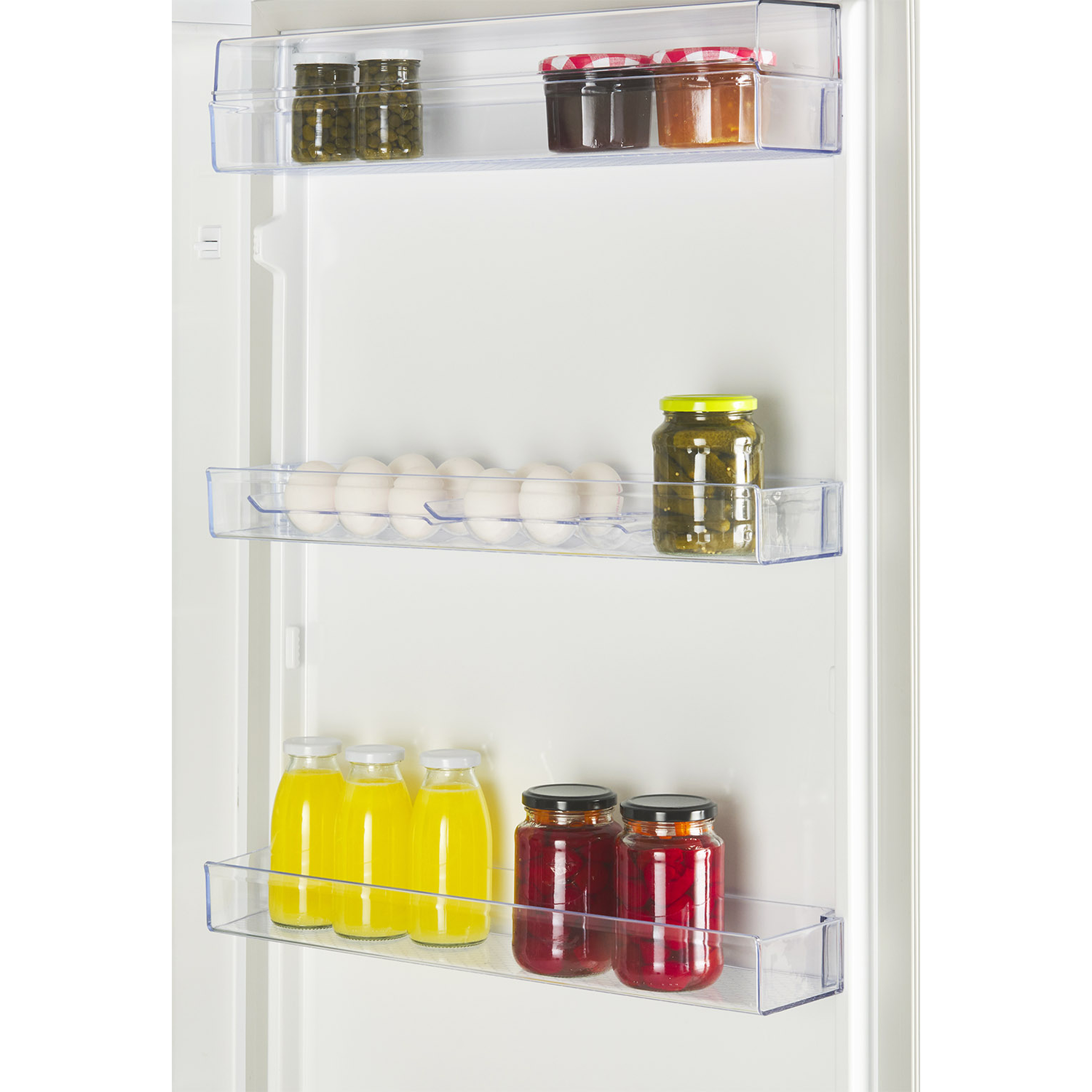 A refrigerator interior with shelves holding food items like jars and bottles.