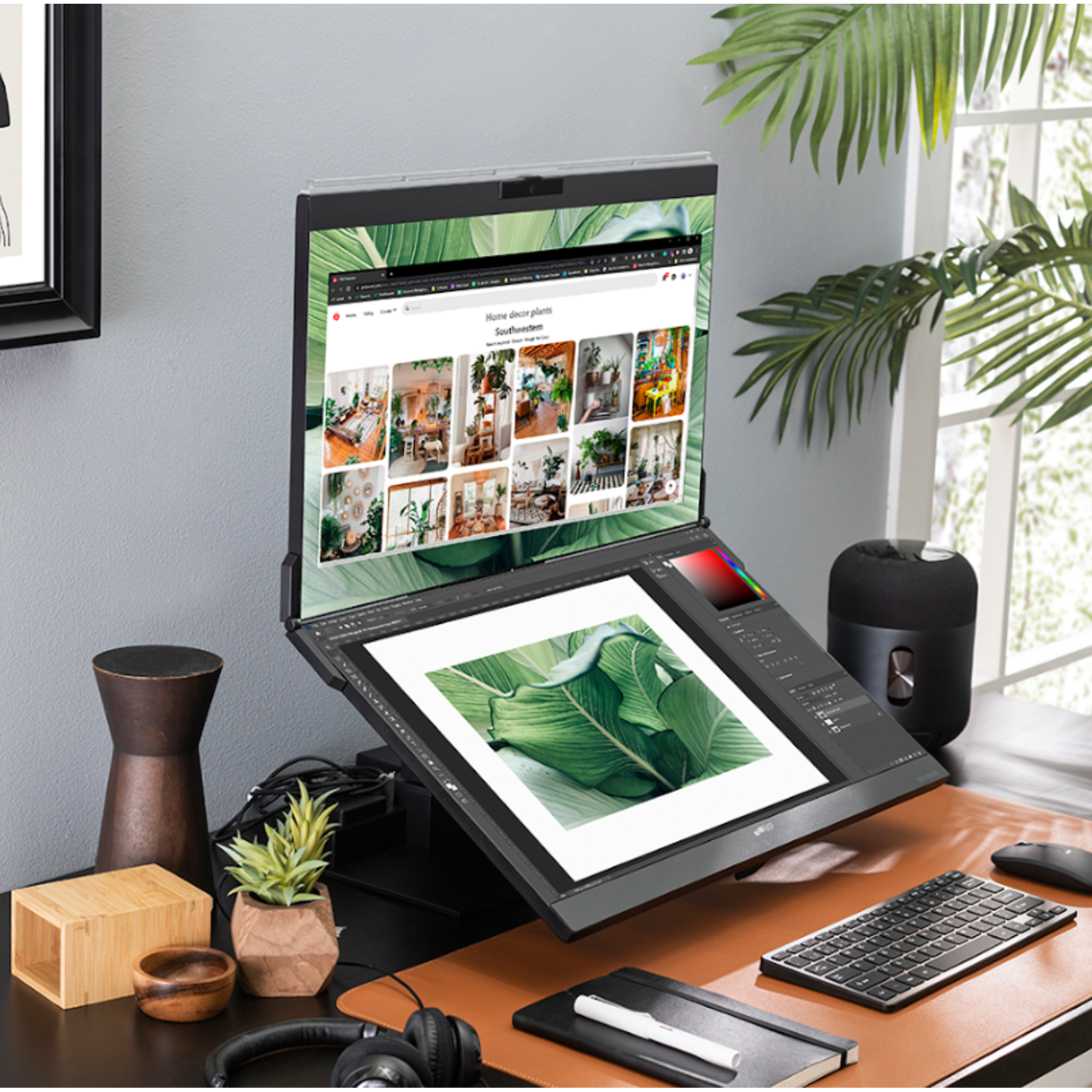 Workspace with a laptop, monitor, desk, and accessories. The monitor is angled.