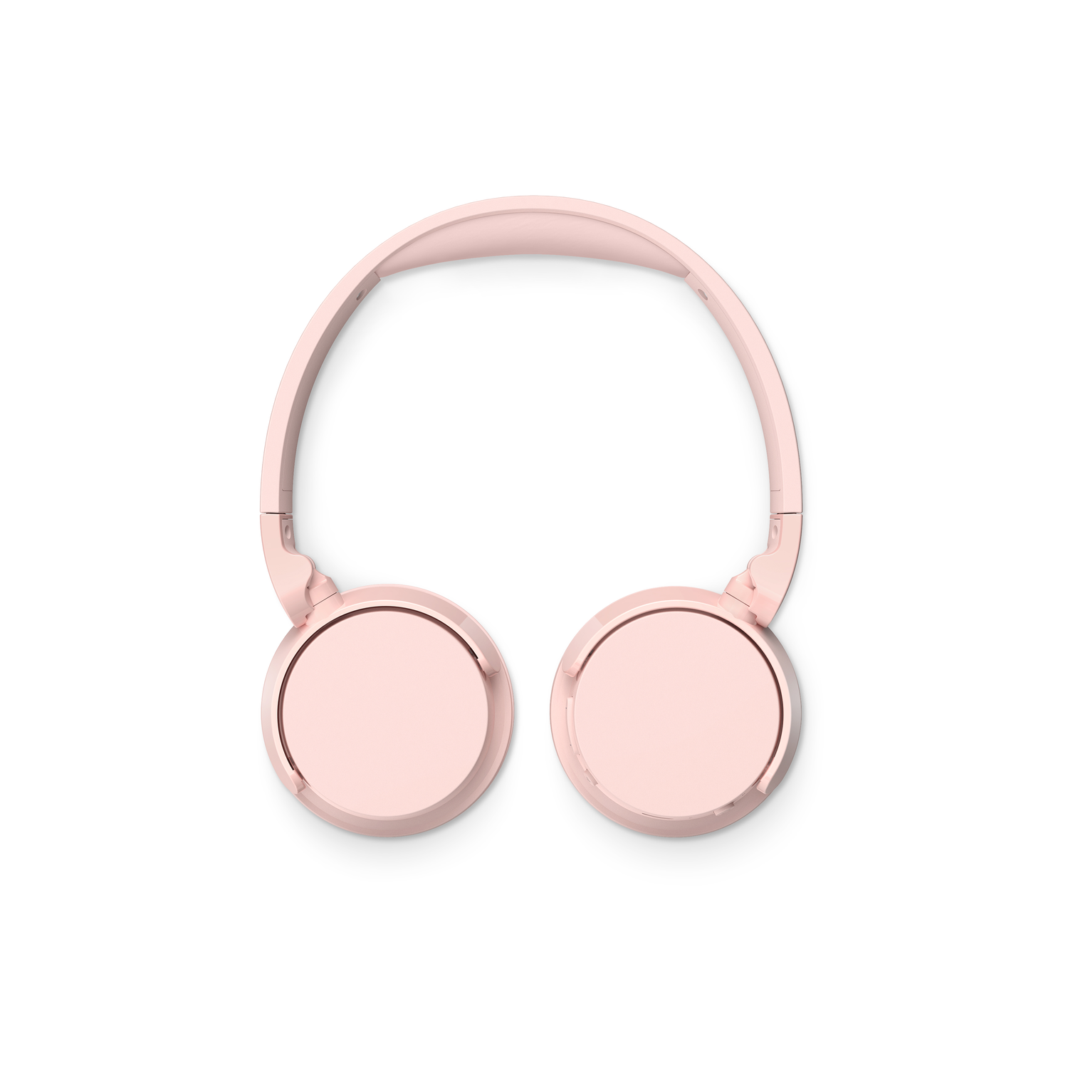 Pink, foldable headphones laid flat on a white surface. Circular ear cups and a headband.