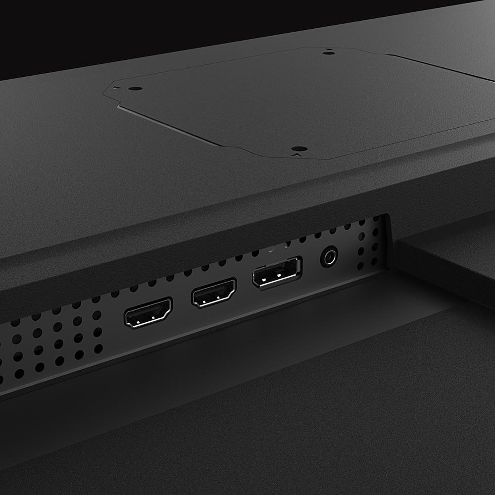 Die Rückseite eines schwarzen Monitors mit Anschlüssen für HDMI, USB und Audio.
