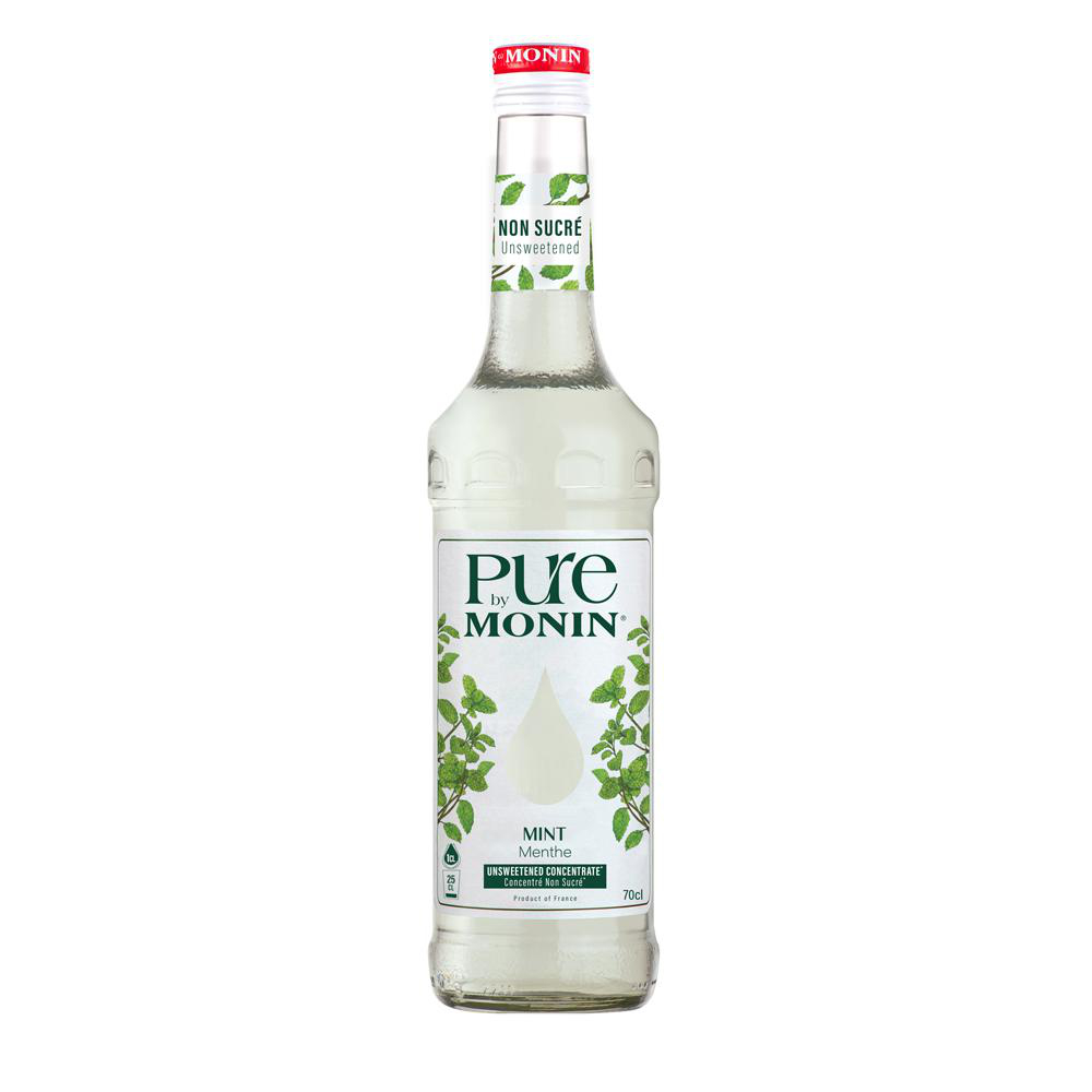Eine hohe Glasflasche Minz-Sirup von Monin, ungesüßt, mit Minzblatt-Illustrationen.