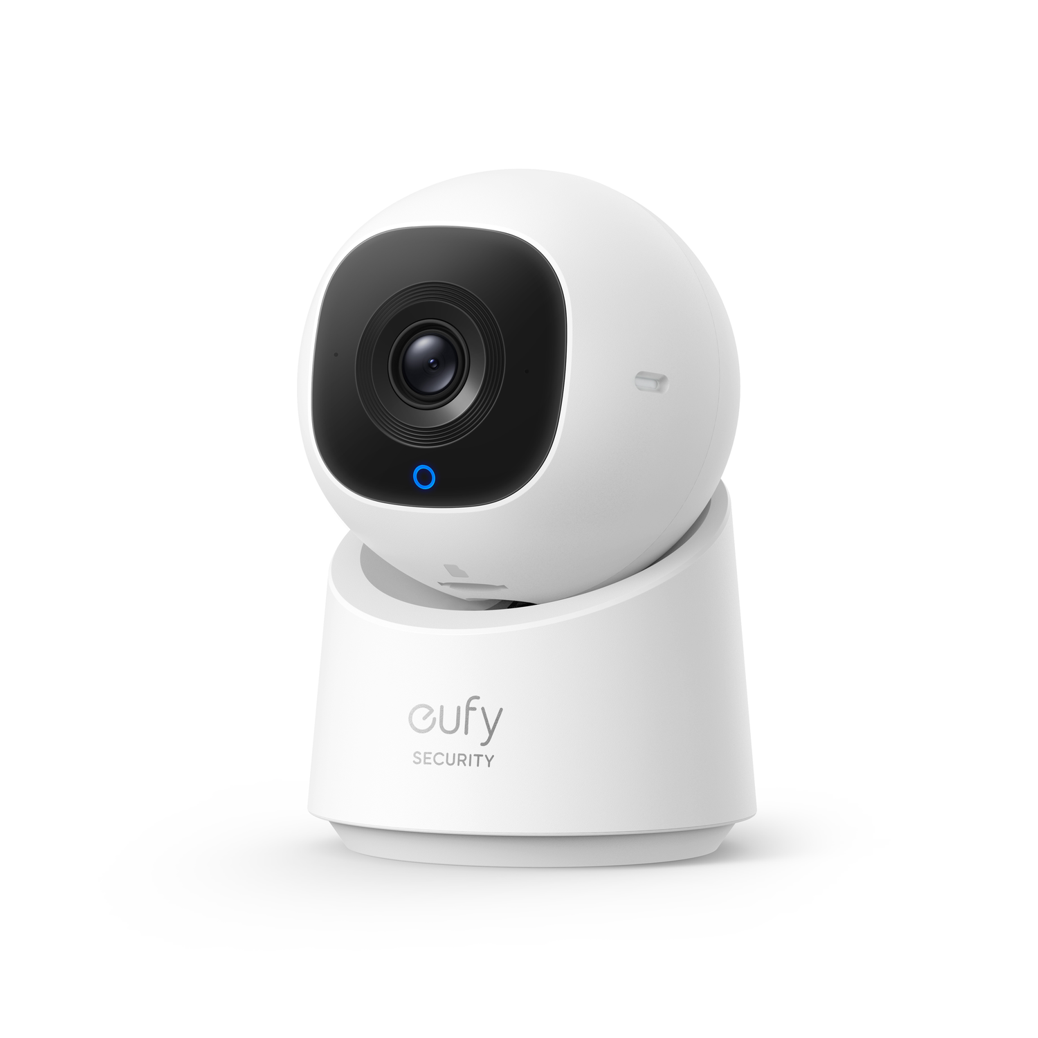 White and black security camera on white background. Blue light on front.