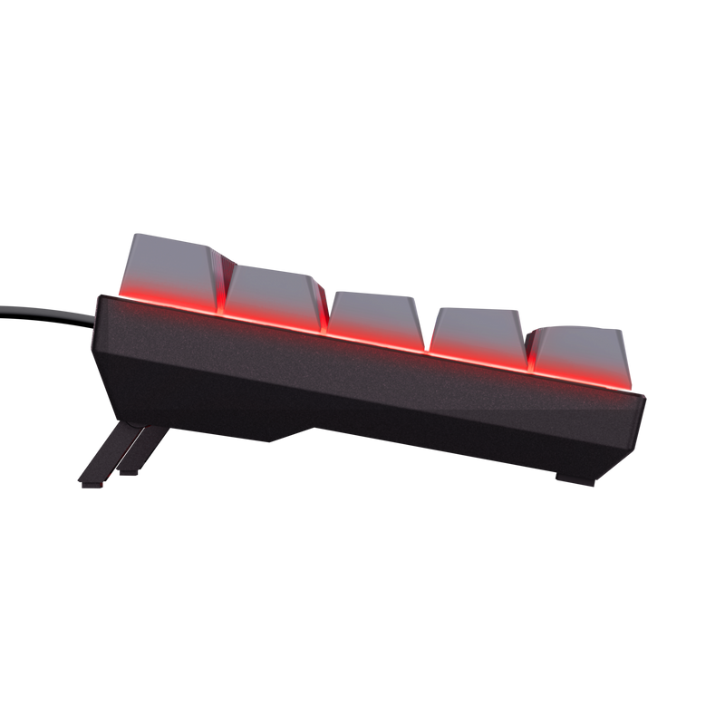 Primer plano de teclado negro con teclas retroiluminadas en rojo, sobre una superficie negra.