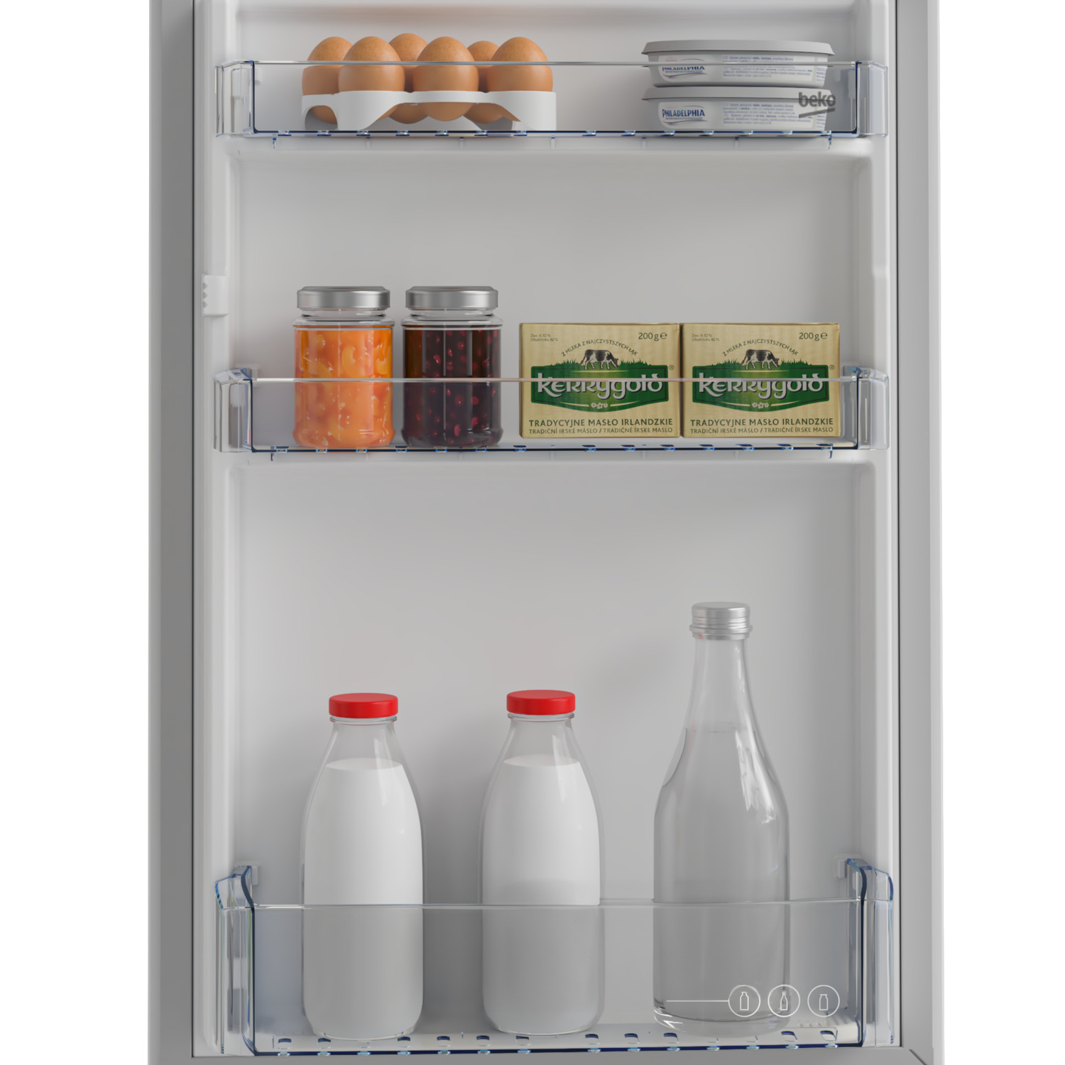 Inside a fridge: eggs, butter, jars, and milk.
